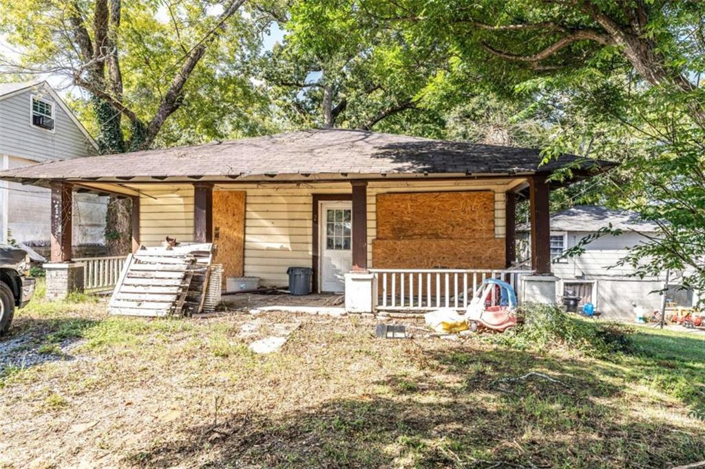 1103 Shorter Avenue Rome, GA 30165 - Photo 11 of 11 a front view of a house with garden
