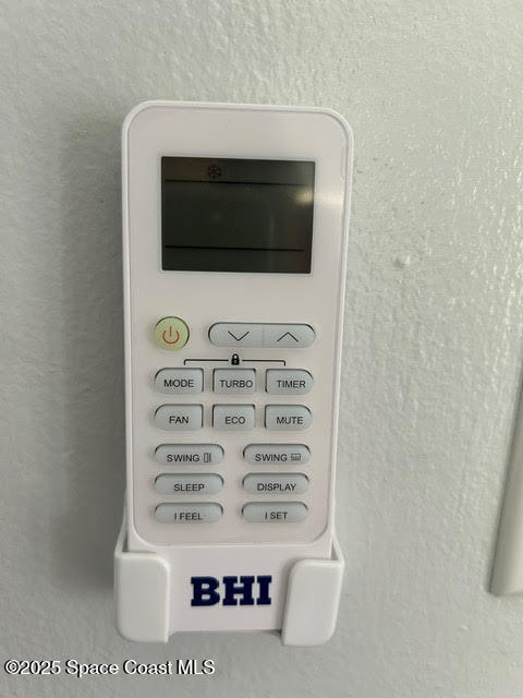 1077 Shares Drive, Unit 2B Rockledge, FL 32955 - Photo 36 of 36 Thermostat Remote