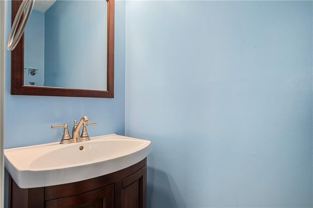 121 Tiffany Ridge Drive Coraopolis, PA 15108 - Photo 12 of 28 A half bath sits behind the kitchen.