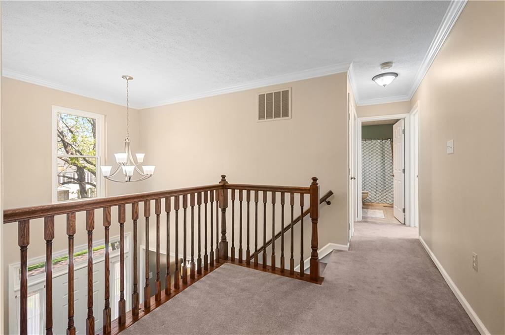 121 Tiffany Ridge Drive Coraopolis, PA 15108 - Photo 14 of 28 The two story entry includes a second story window that offers plenty of natural light.