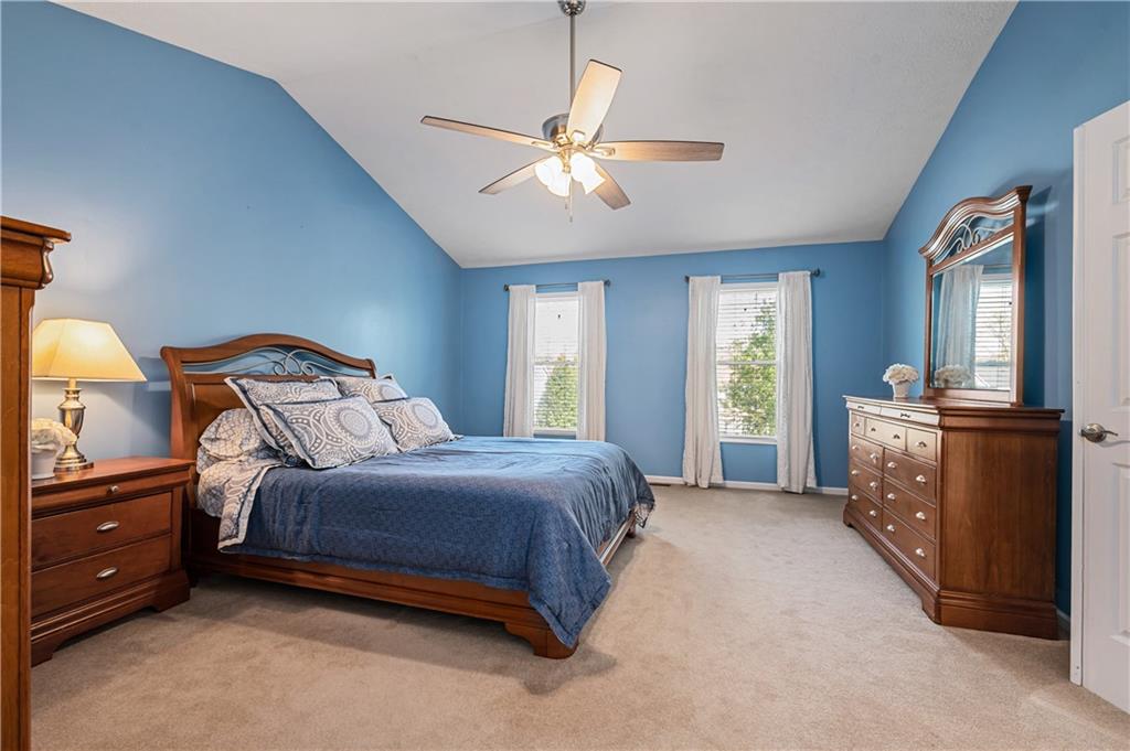 121 Tiffany Ridge Drive Coraopolis, PA 15108 - Photo 15 of 28 The large primary suite offers a vaulted ceiling with a ceiling fan light.