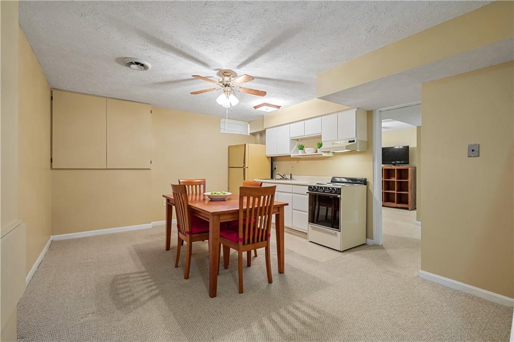 121 Tiffany Ridge Drive Coraopolis, PA 15108 - Photo 23 of 28 The basement includes a kitchenette.