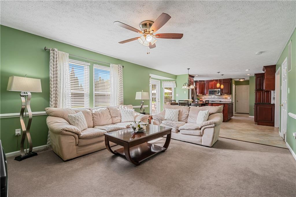 121 Tiffany Ridge Drive Coraopolis, PA 15108 - Photo 7 of 28 The spacious family room is a great space to relax.