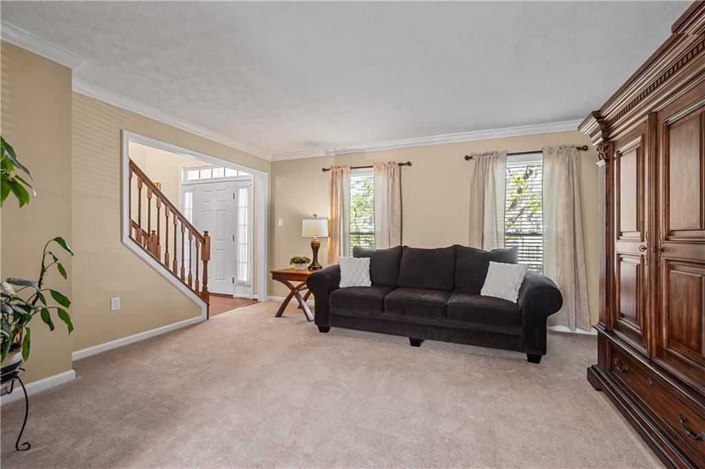 121 Tiffany Ridge Drive Coraopolis, PA 15108 - Photo 10 of 28 The formal living room is large enough for plenty of furniture.