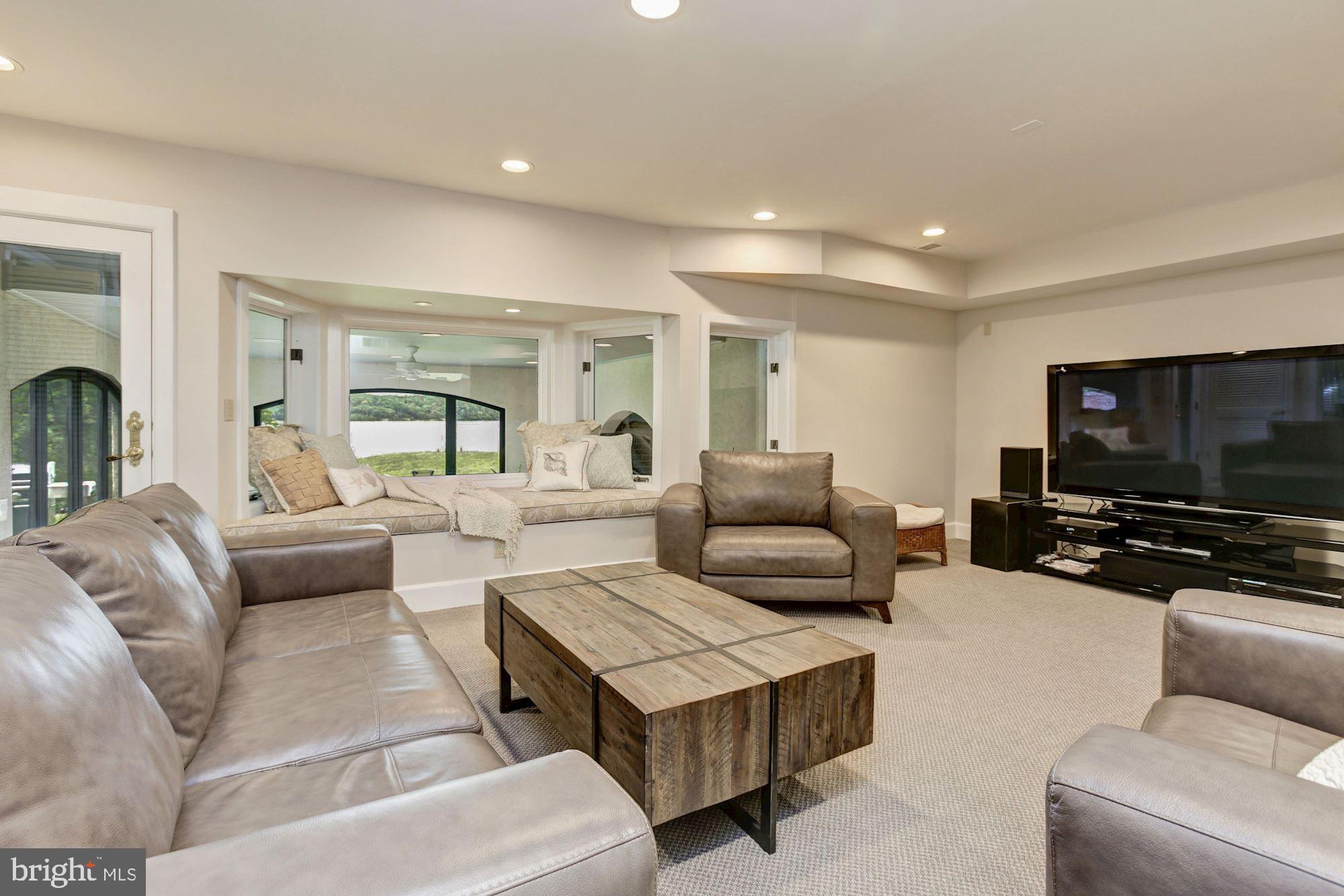 302 Rugby Cove Arnold, MD 21012 - Photo 48 of 61 Lower level family room opens to screened-in porch