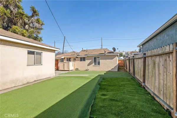 a view of a yard in front of a house