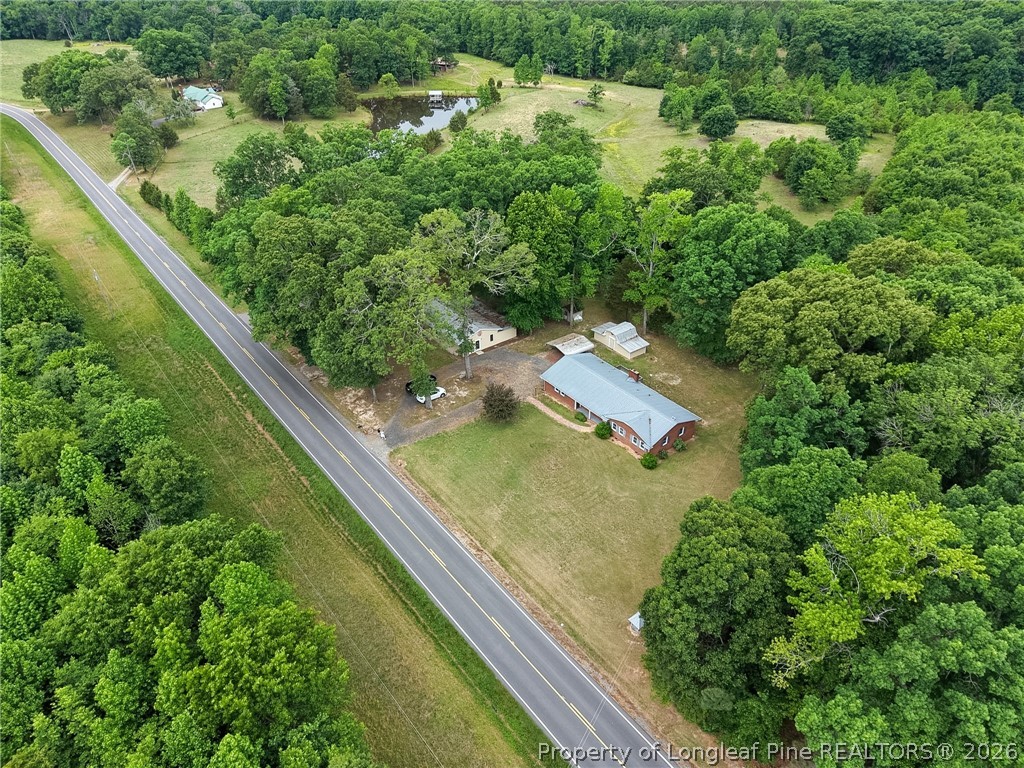 3384 Goldston Glendon Road Goldston, NC 27252 - Photo 2 of 47 a view of a garden from a balcony