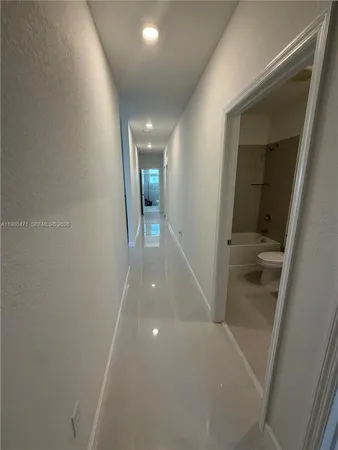 a room with gym equipment and a window