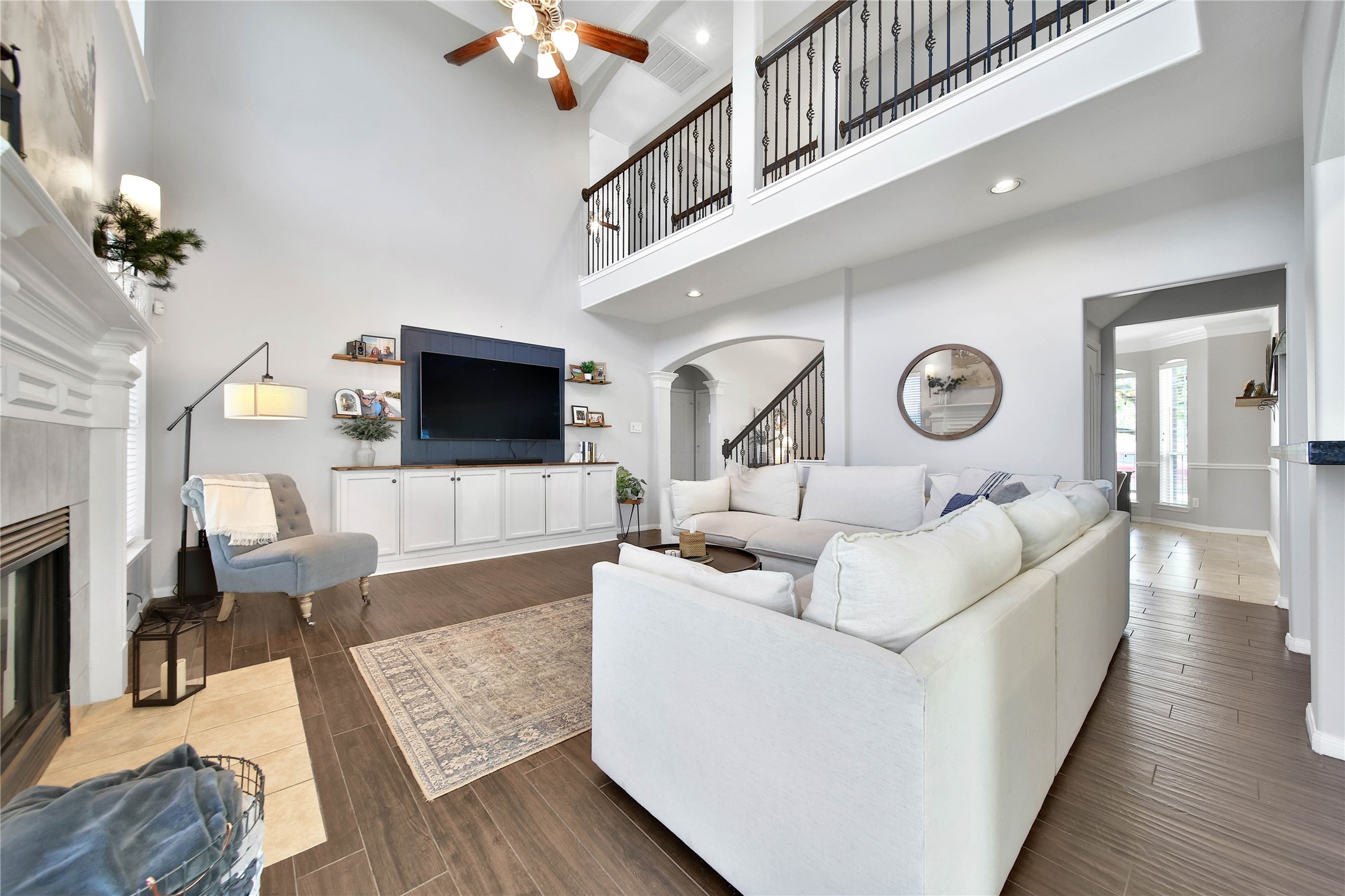 21715 Flecherwood Court Spring, TX 77388 - Photo 12 of 43 a living room with furniture and a flat screen tv