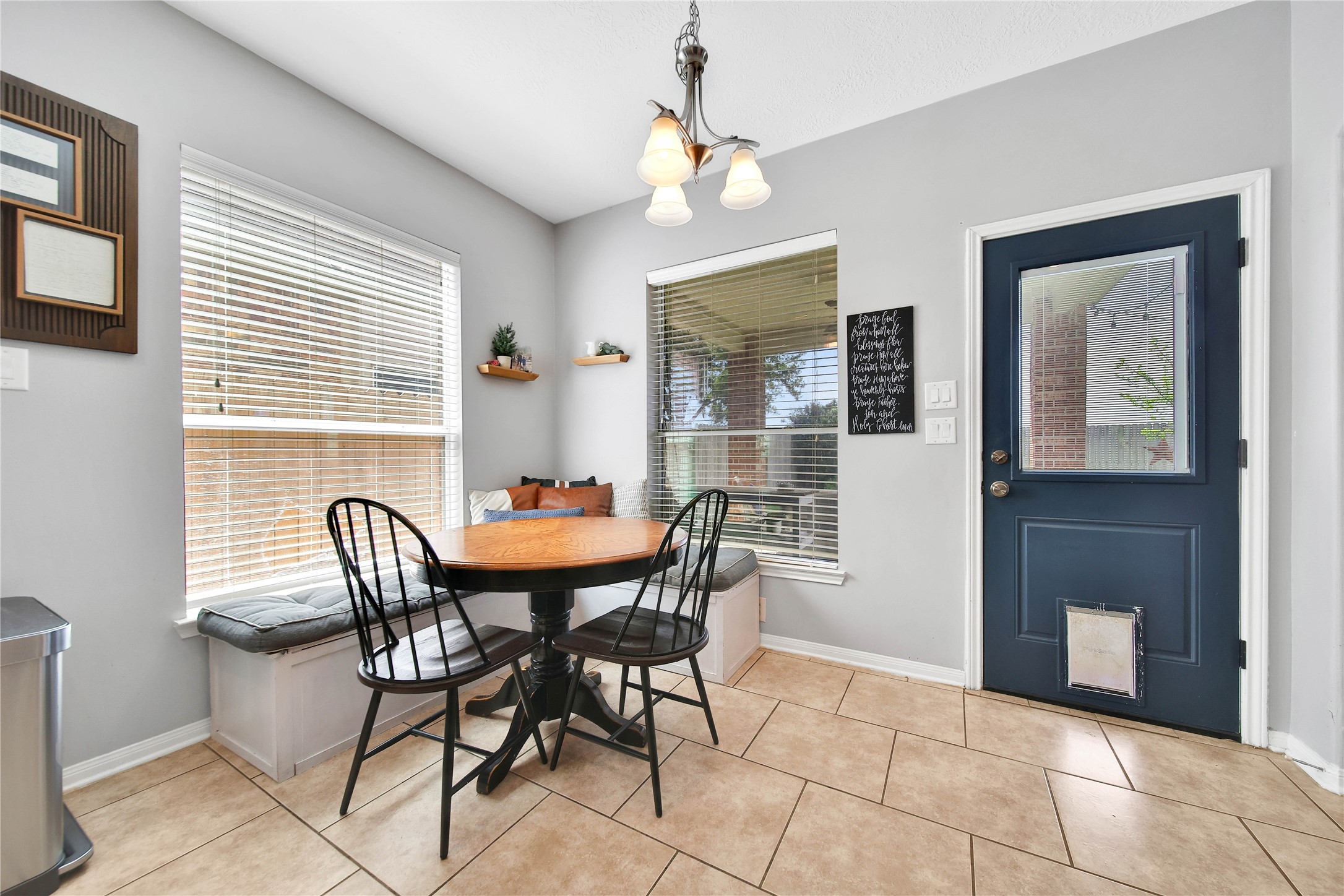 21715 Flecherwood Court Spring, TX 77388 - Photo 17 of 43 a view of a dining room with furniture and window
