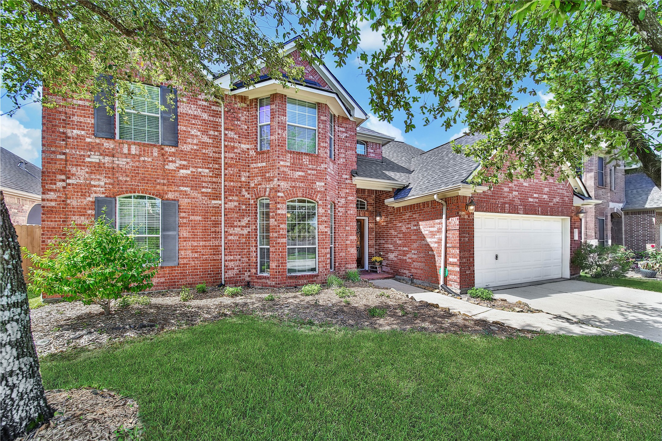 21715 Flecherwood Court Spring, TX 77388 - Photo 2 of 43 front view of a house with a yard