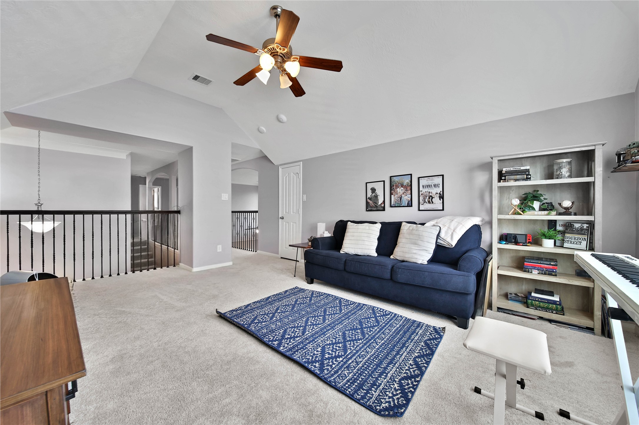 21715 Flecherwood Court Spring, TX 77388 - Photo 24 of 43 a living room with furniture and a rug