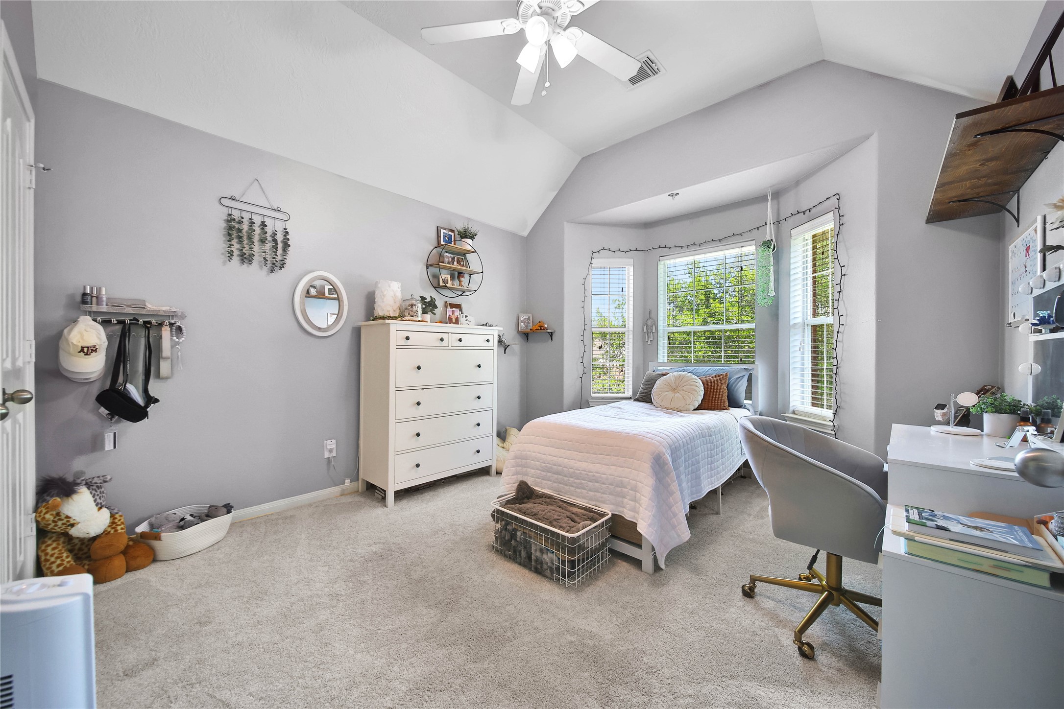 21715 Flecherwood Court Spring, TX 77388 - Photo 26 of 43 a bedroom with a bed and a desk