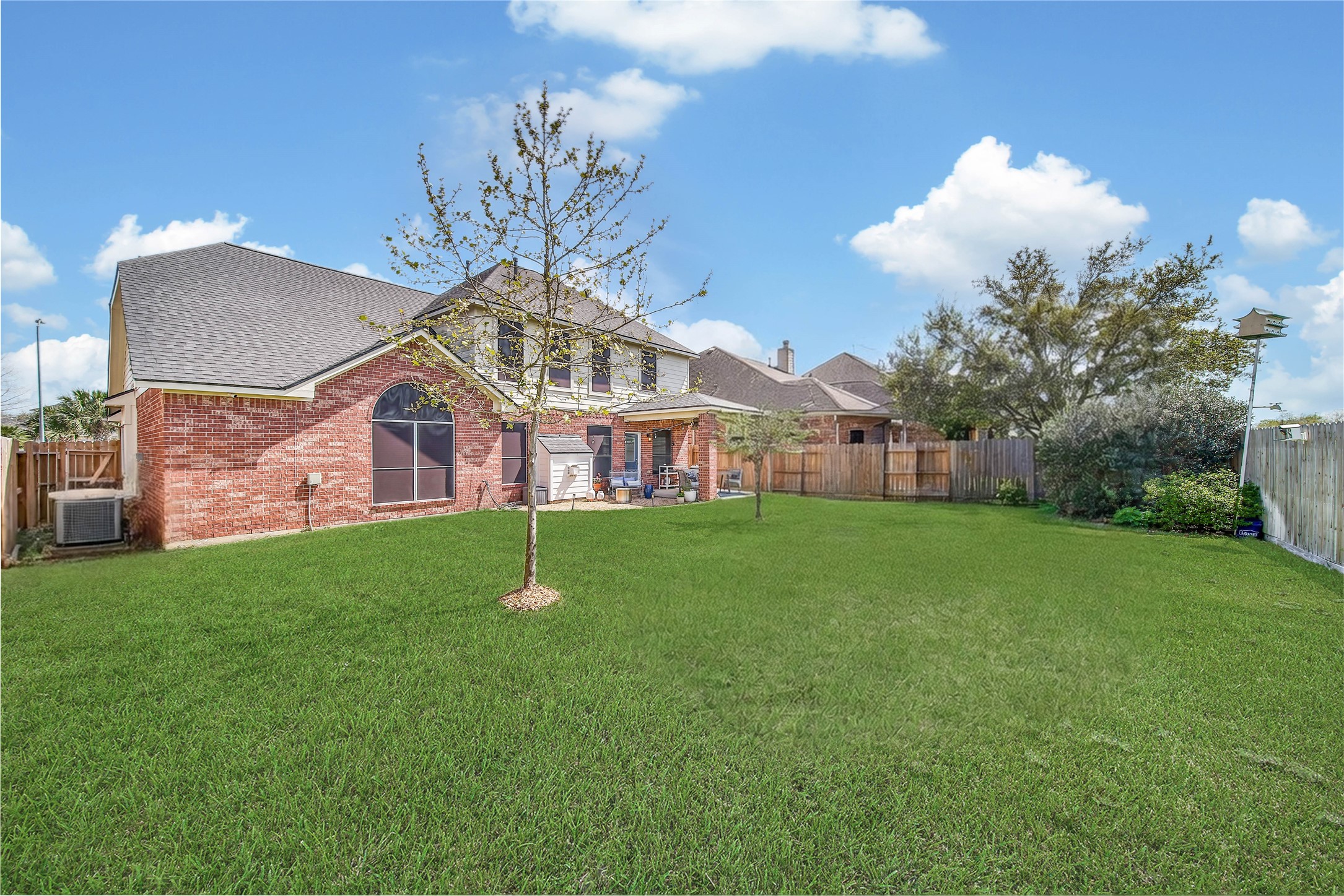 21715 Flecherwood Court Spring, TX 77388 - Photo 33 of 43 a view of a house with a backyard