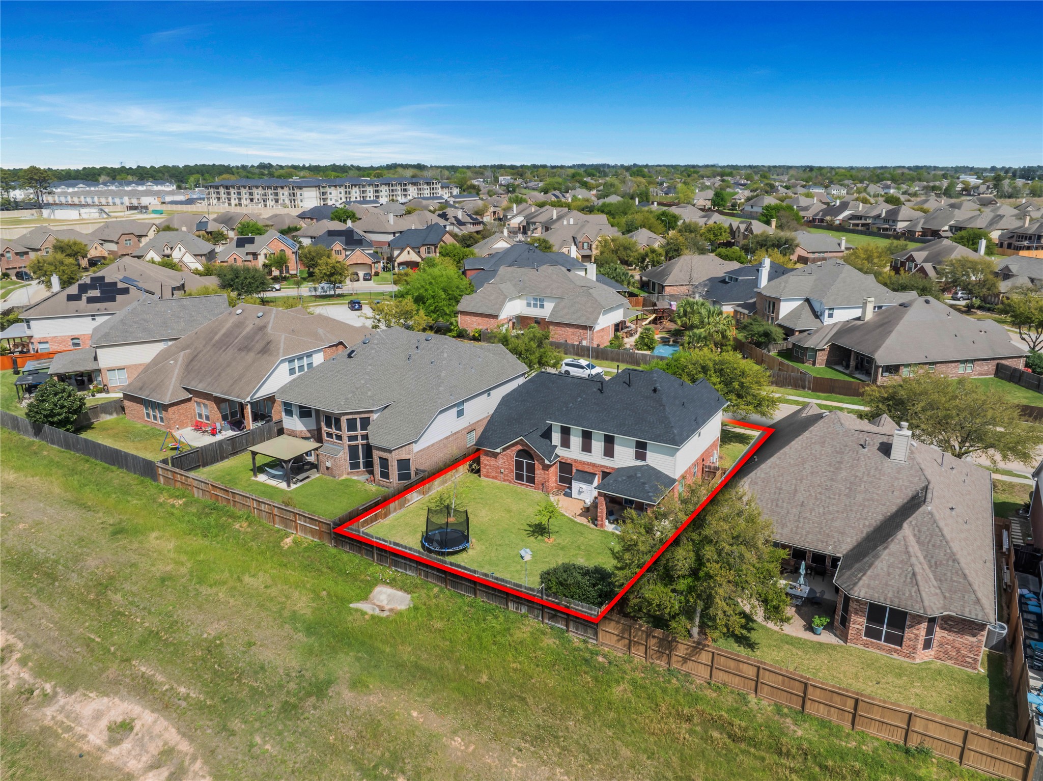21715 Flecherwood Court Spring, TX 77388 - Photo 37 of 43 an aerial view of residential houses with outdoor space and ocean view