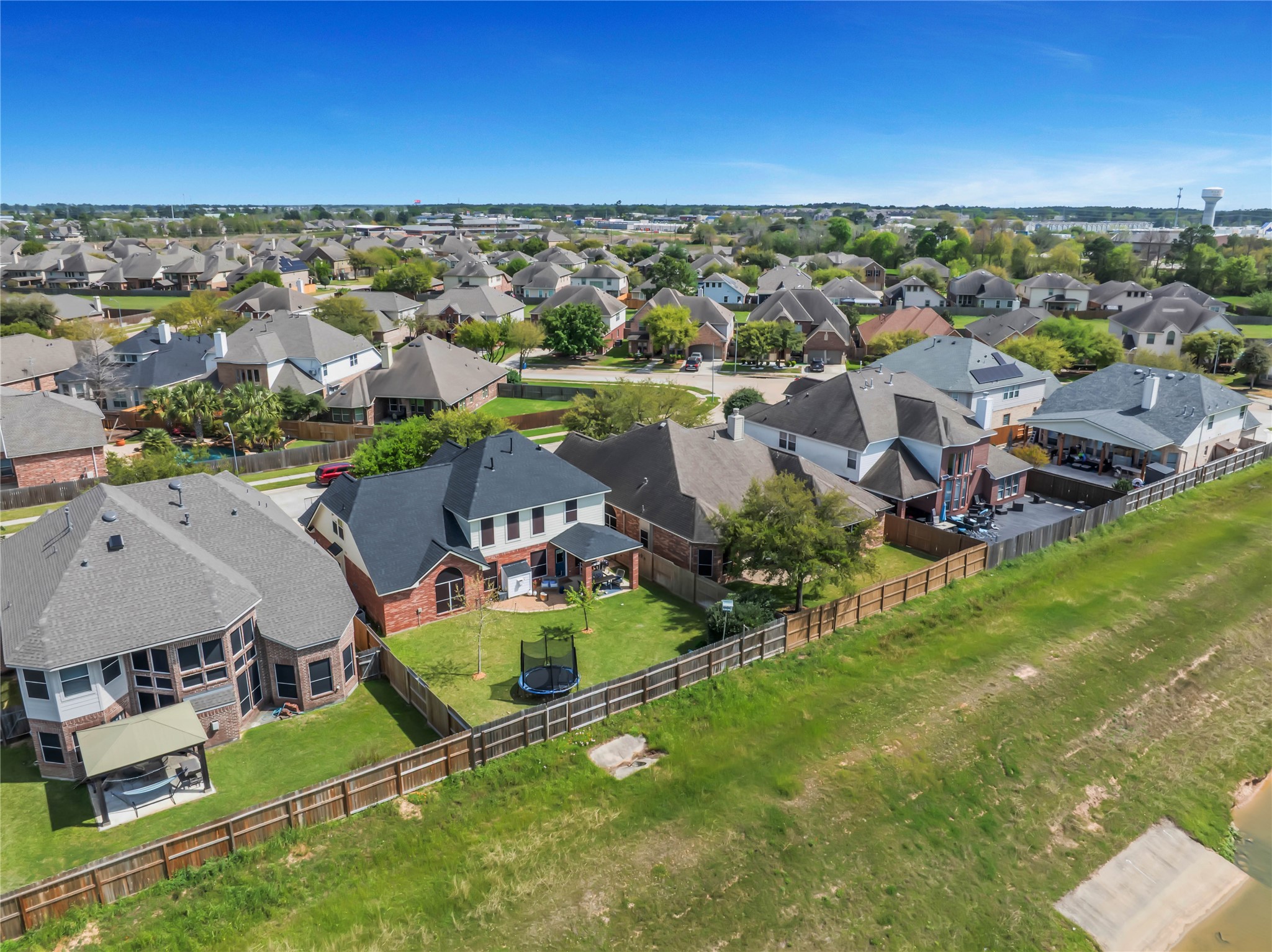 21715 Flecherwood Court Spring, TX 77388 - Photo 38 of 43 an aerial view of residential houses with outdoor space and ocean view