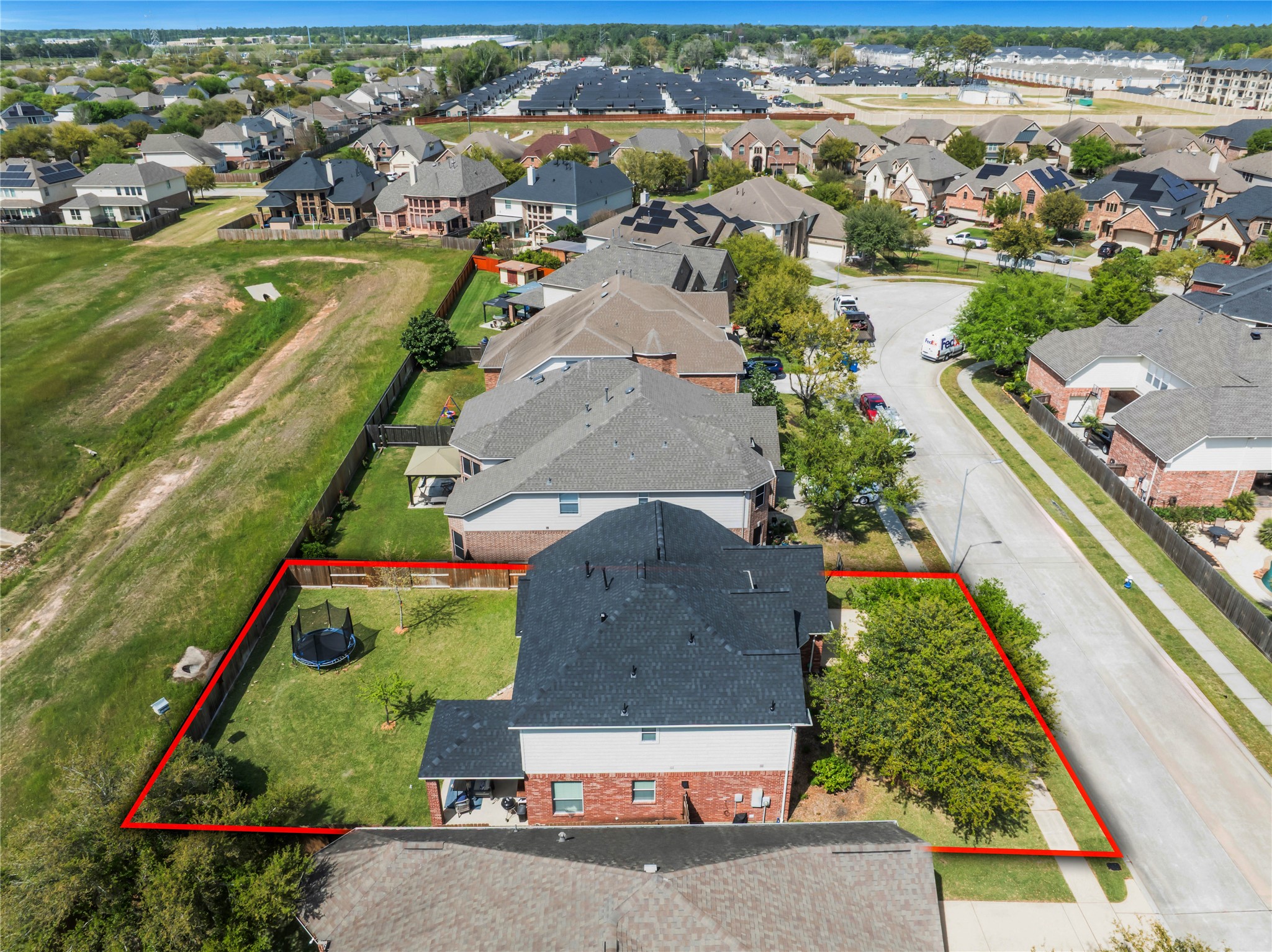 21715 Flecherwood Court Spring, TX 77388 - Photo 40 of 43 an aerial view of residential houses with outdoor space