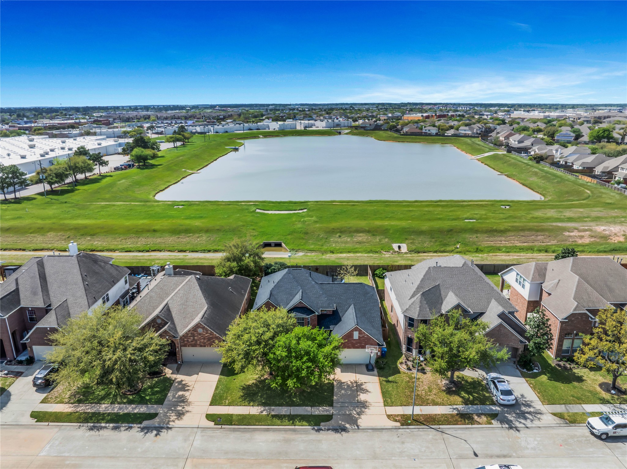 21715 Flecherwood Court Spring, TX 77388 - Photo 42 of 43 an aerial view of residential building and lake view