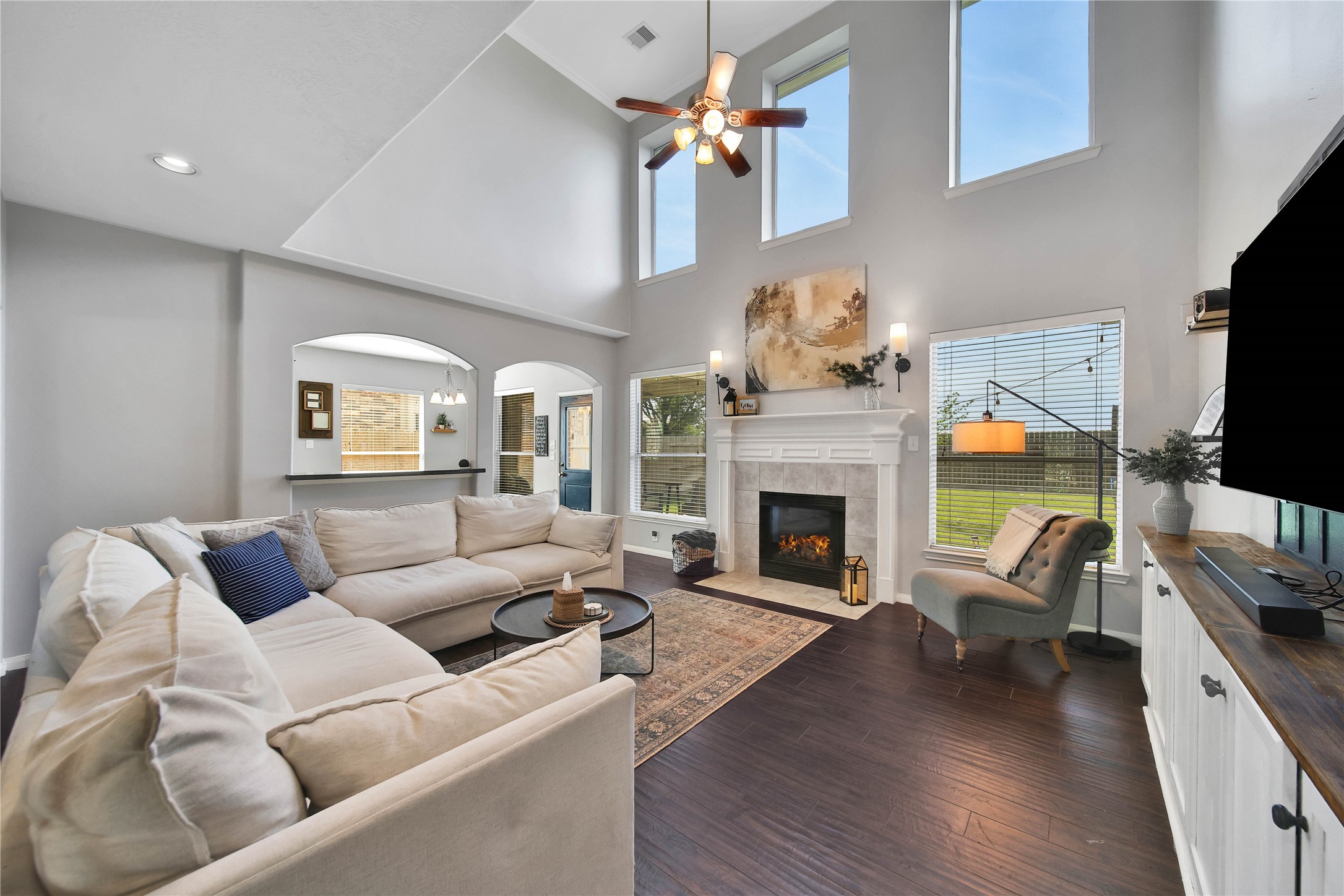 21715 Flecherwood Court Spring, TX 77388 - Photo 10 of 43 a living room with furniture fireplace and flat screen tv