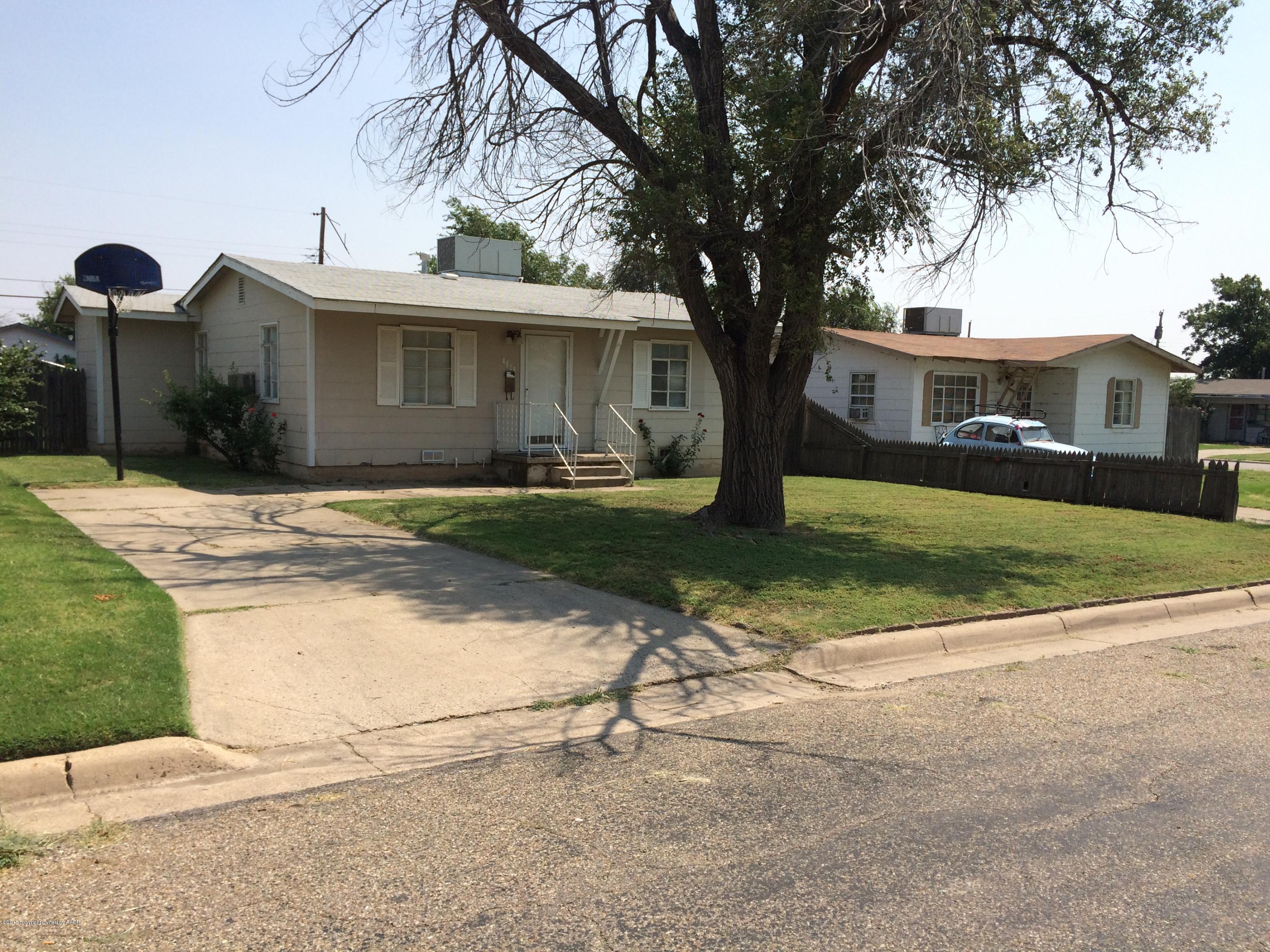 4635 South Hayden Street Amarillo, TX 79110 - Photo 1 of 10 a front view of a house with a yard and garage