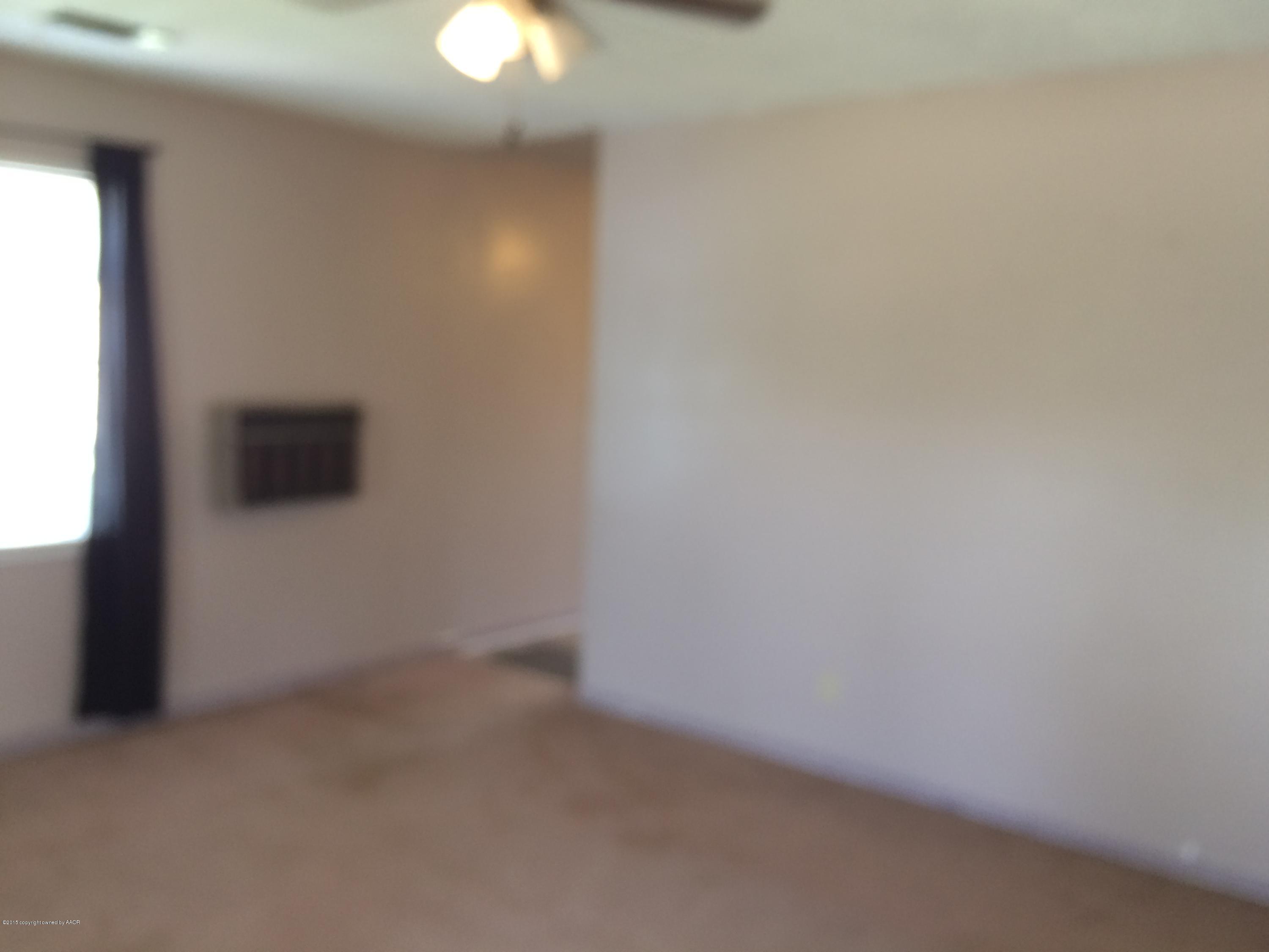 4635 South Hayden Street Amarillo, TX 79110 - Photo 4 of 10 a view of empty room