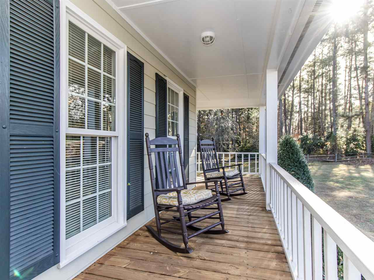 4108 Southall Road Raleigh, NC 27604 - Photo 3 of 25 Wrap around lemonade porch extends three sides of the house! Front Porch