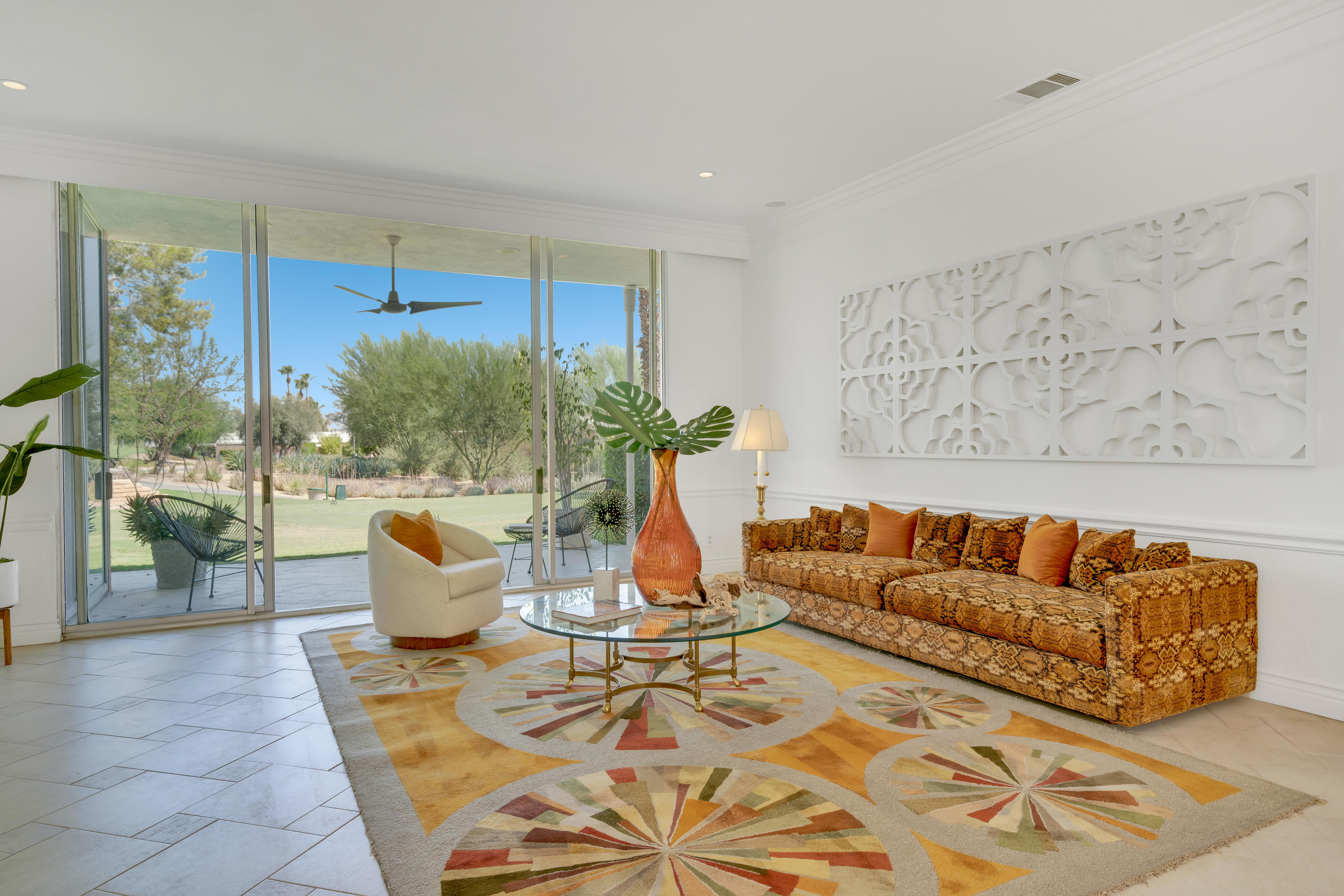 47420 Rabat Drive Palm Desert, CA 92260 - Photo 2 of 50 a living room with a couch and a coffee table