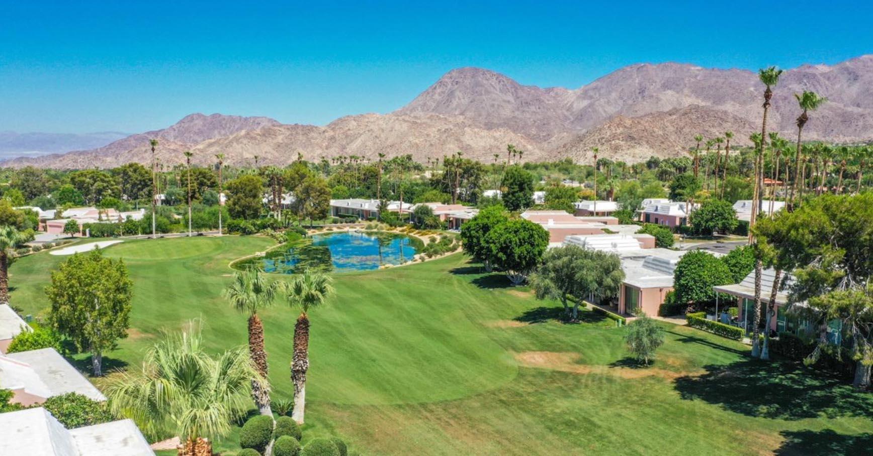 47420 Rabat Drive Palm Desert, CA 92260 - Photo 26 of 50 a view of a lush green hillside and houses
