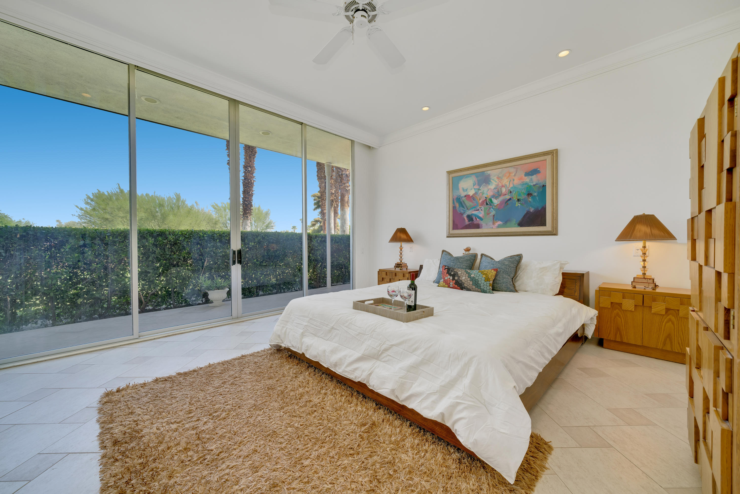 47420 Rabat Drive Palm Desert, CA 92260 - Photo 30 of 50 a bed sitting in a bedroom next to a window