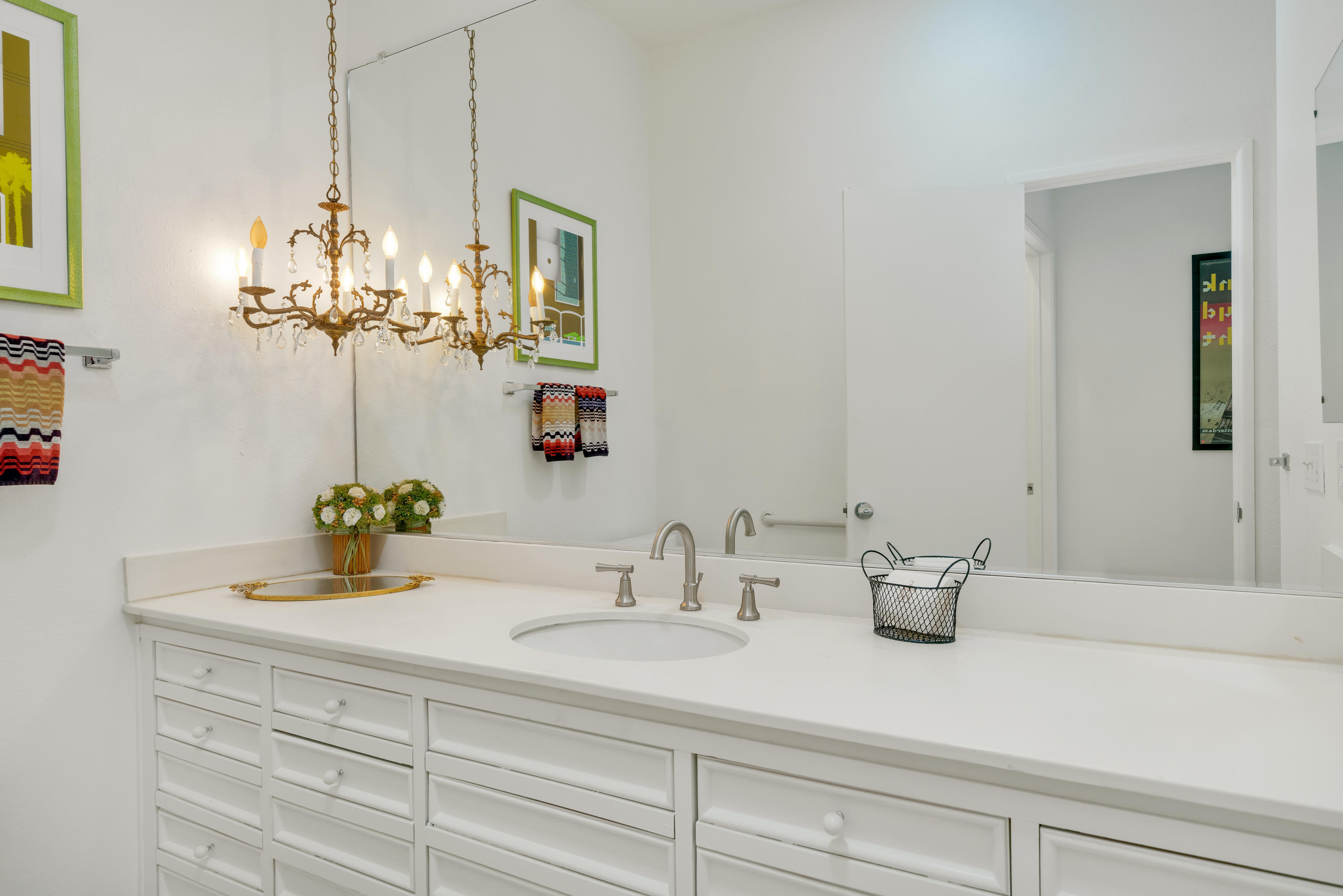 47420 Rabat Drive Palm Desert, CA 92260 - Photo 34 of 50 a bathroom with a sink and a mirror