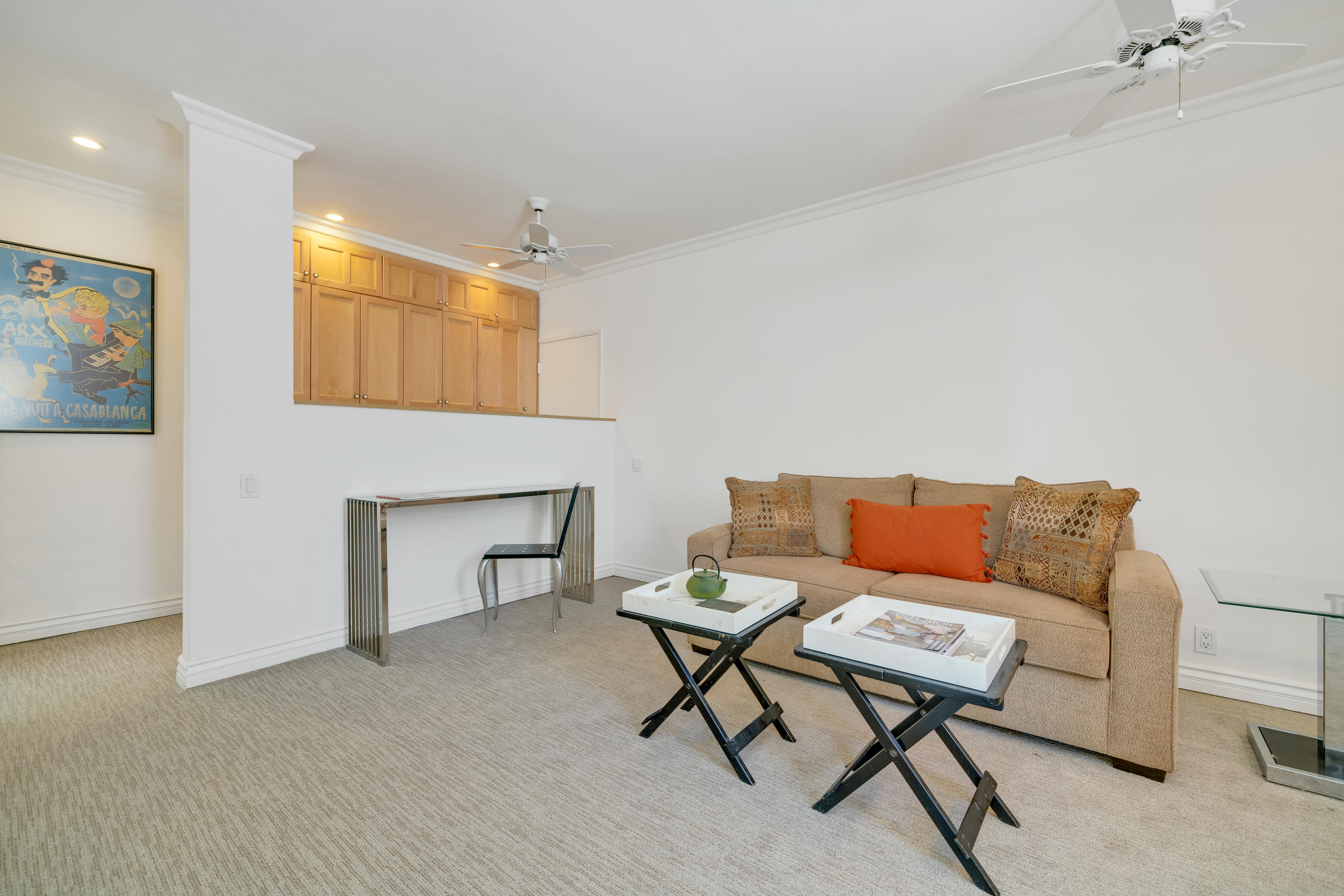 47420 Rabat Drive Palm Desert, CA 92260 - Photo 36 of 50 a living room with furniture and a fireplace