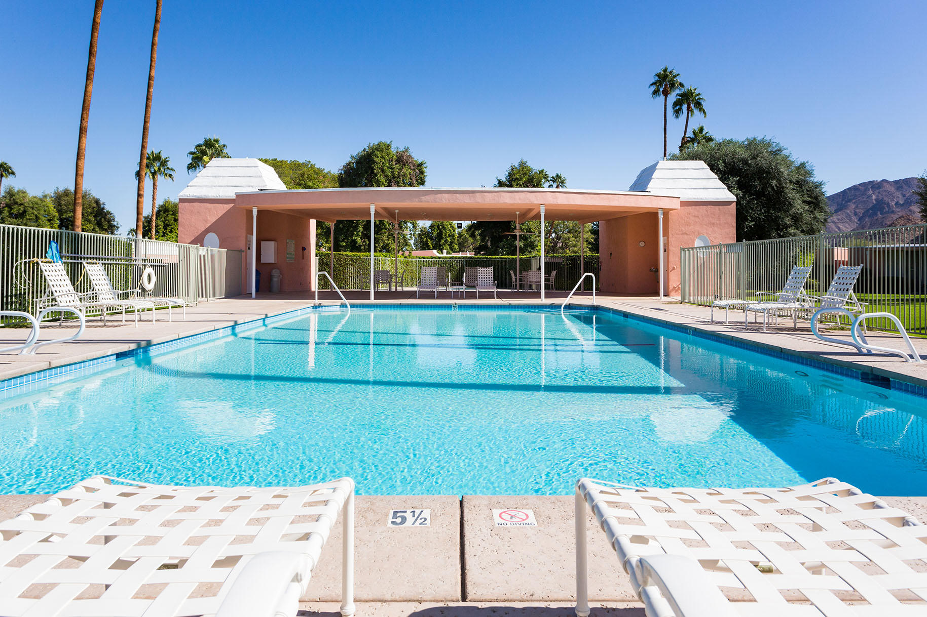 47420 Rabat Drive Palm Desert, CA 92260 - Photo 41 of 50 a view of a house with a swimming pool