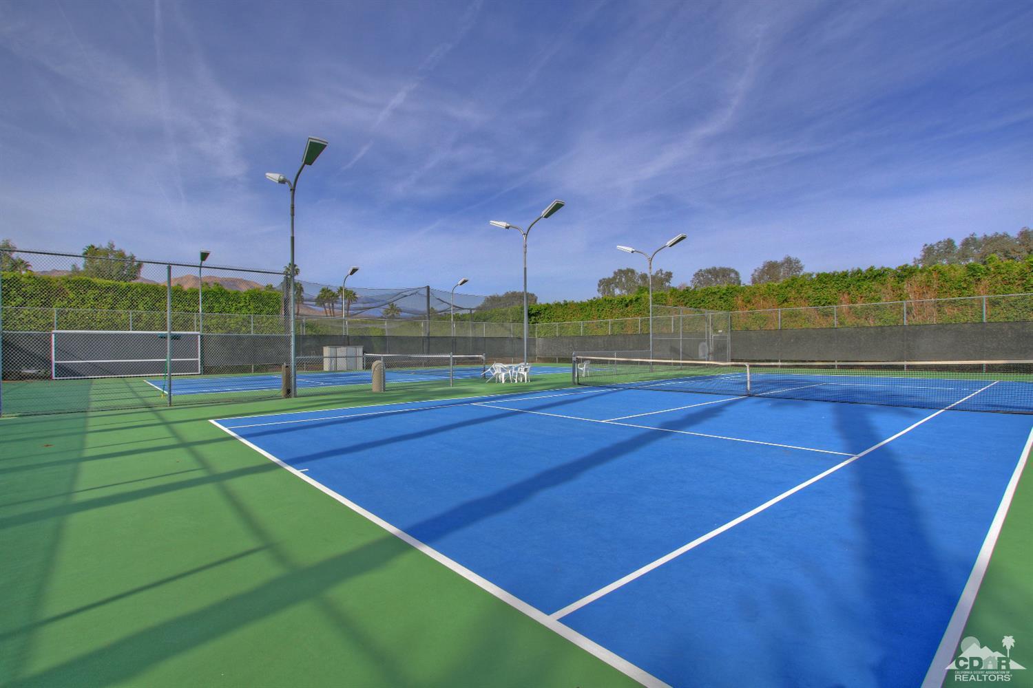 47420 Rabat Drive Palm Desert, CA 92260 - Photo 43 of 50 a view of an outdoor space and tennis court