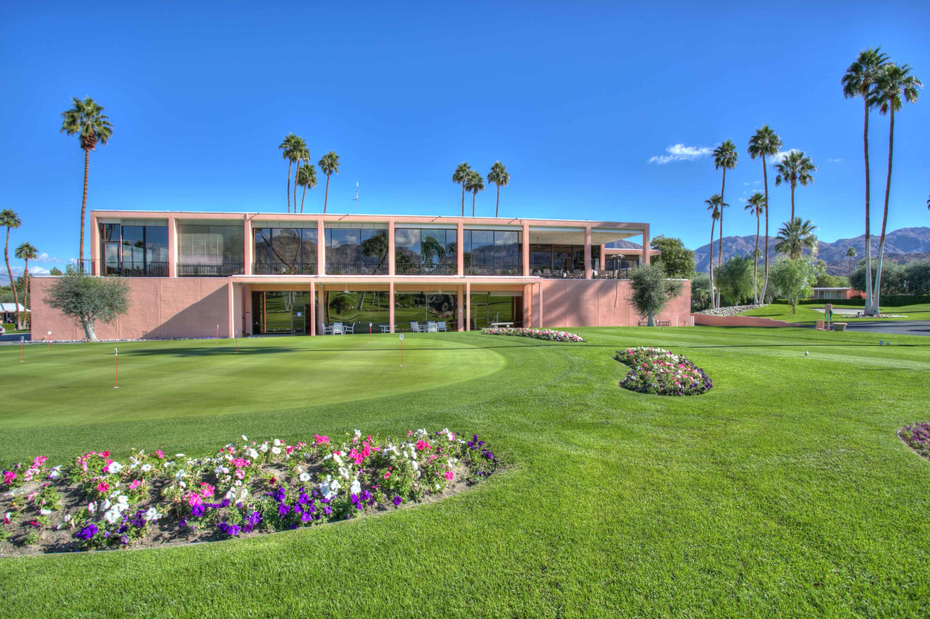 47420 Rabat Drive Palm Desert, CA 92260 - Photo 45 of 50 a view of a house with a big yard and potted plants
