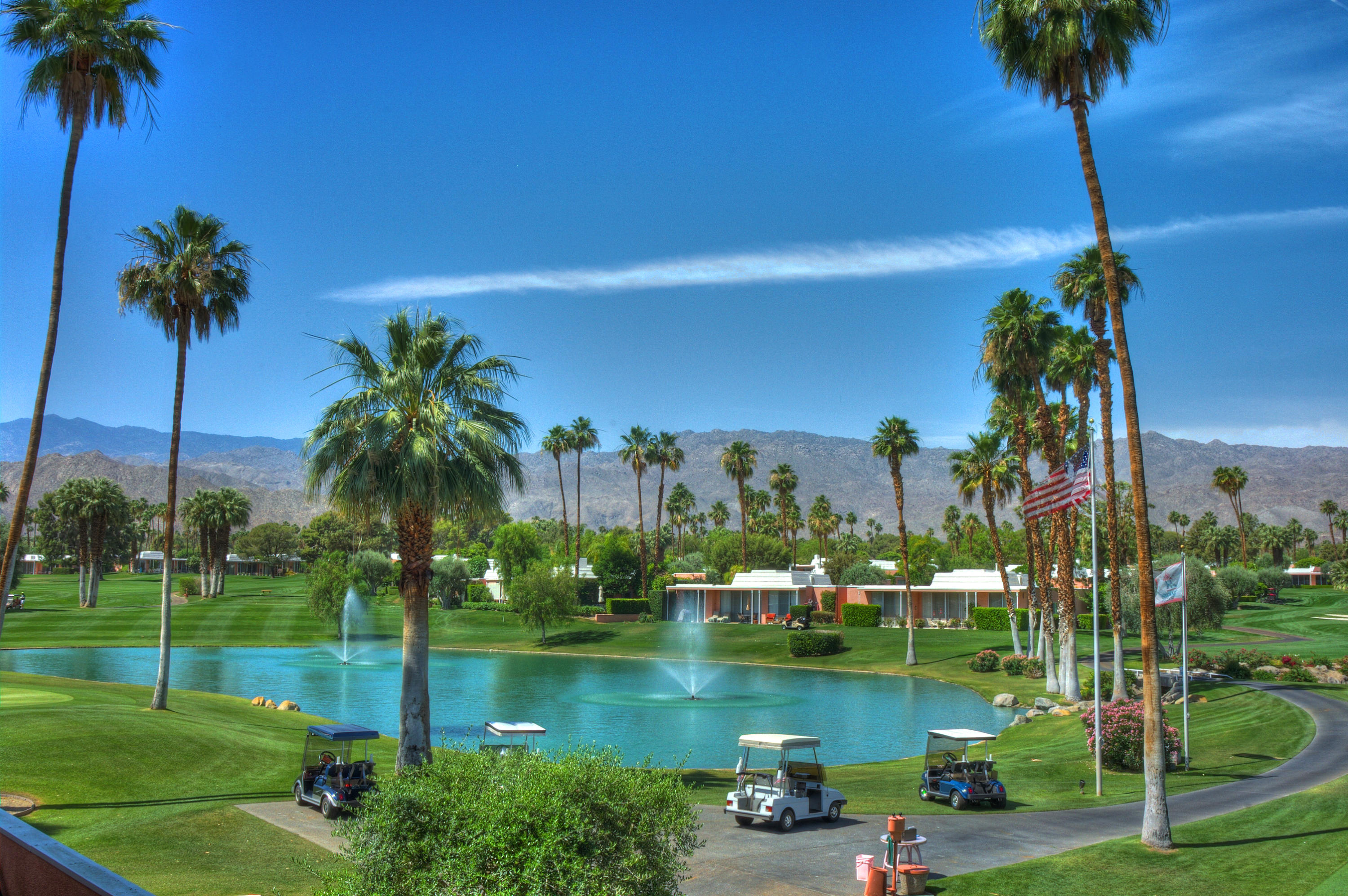 47420 Rabat Drive Palm Desert, CA 92260 - Photo 47 of 50 a view of a lake with a palm trees