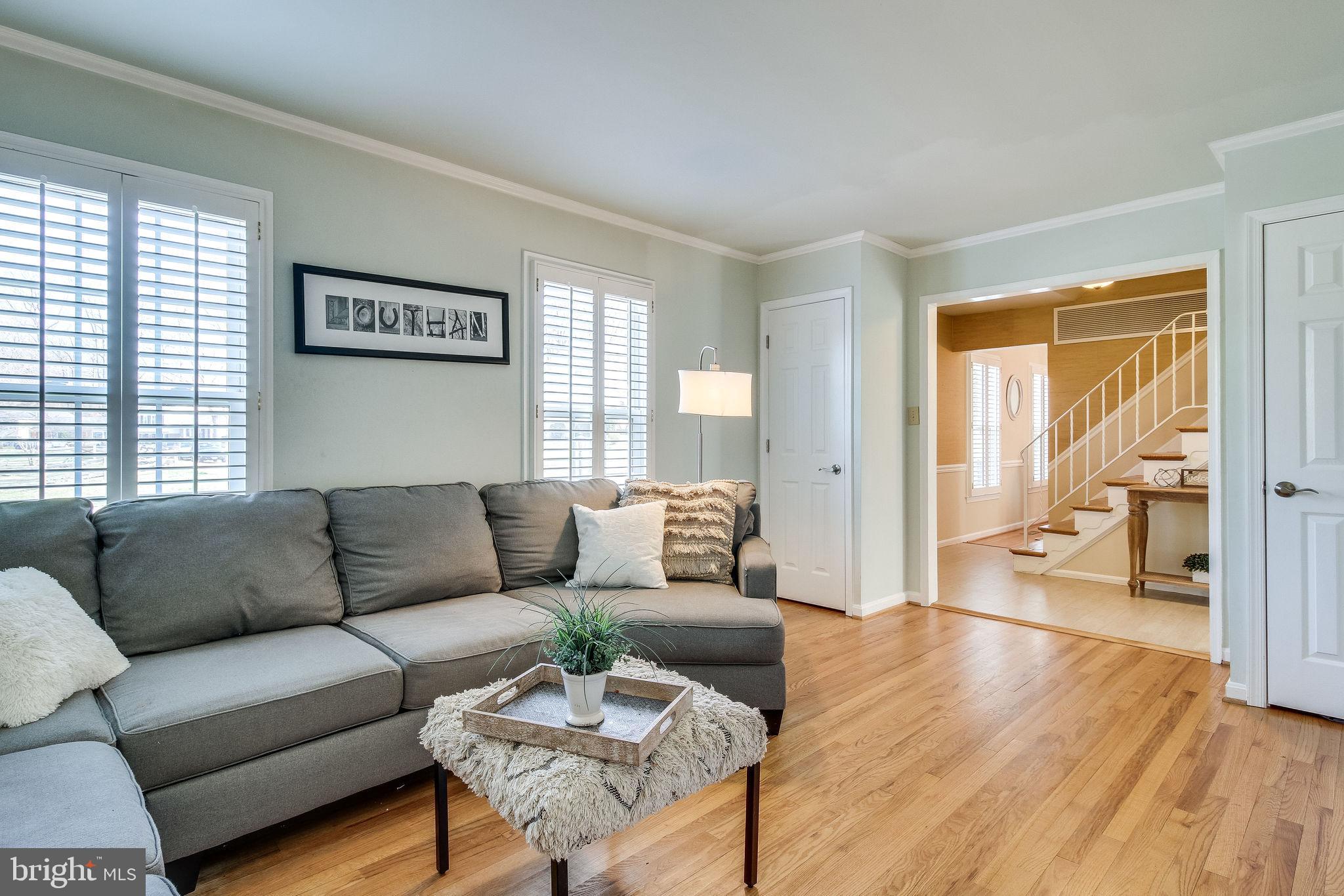9303 Winbourne Road Burke, VA 22015 - Photo 13 of 80 Living room with two hall closets