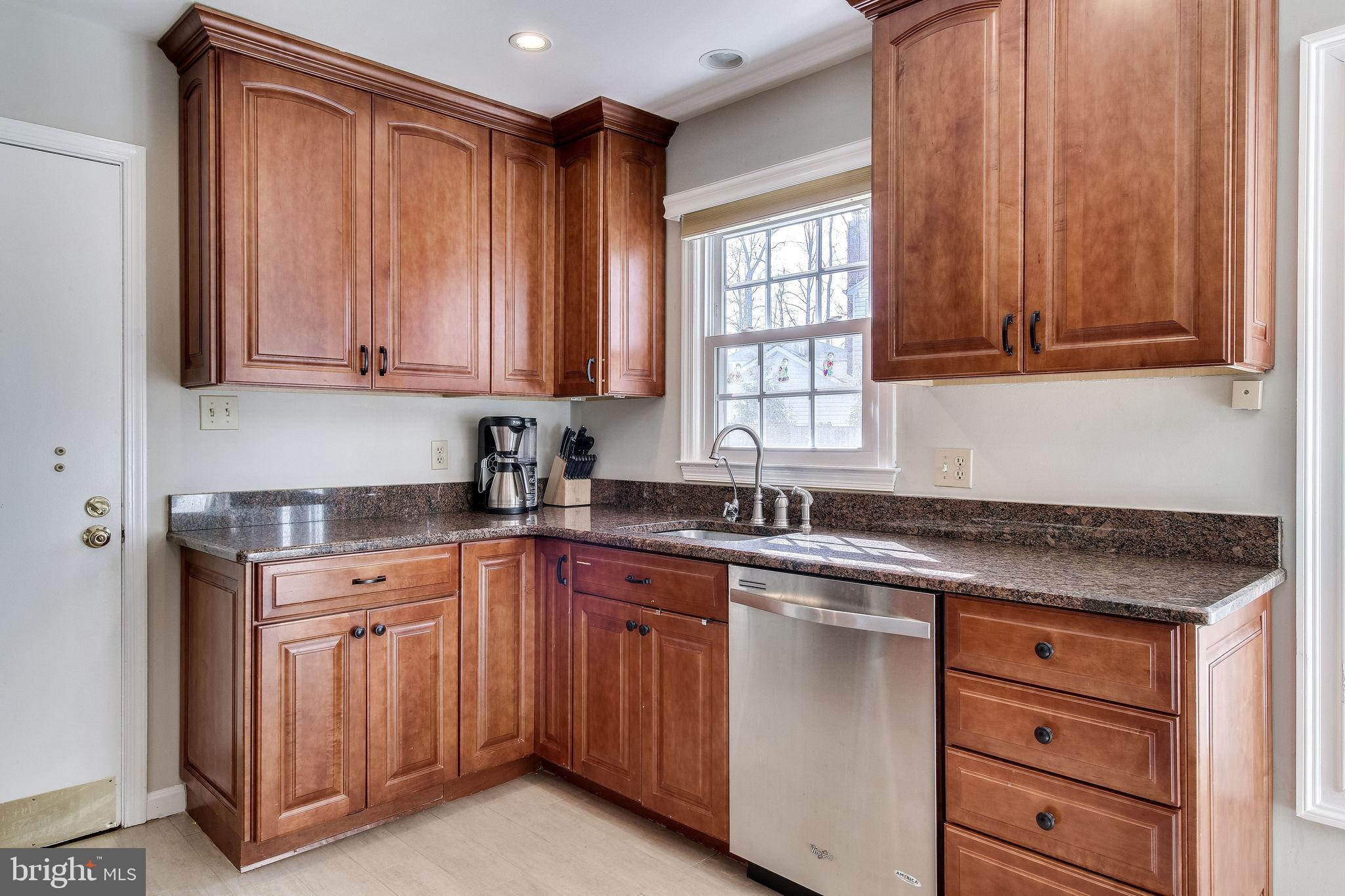 9303 Winbourne Road Burke, VA 22015 - Photo 22 of 80 Kitchen with granite and updated cabinets