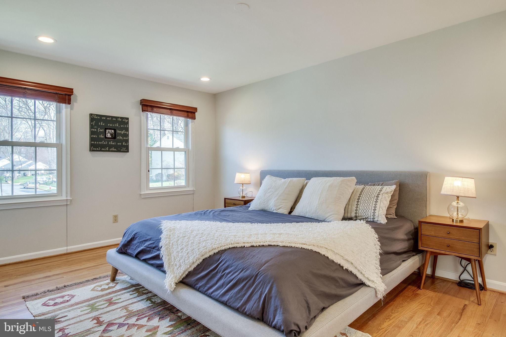 9303 Winbourne Road Burke, VA 22015 - Photo 33 of 80 Large master bedroom has hardwood floors