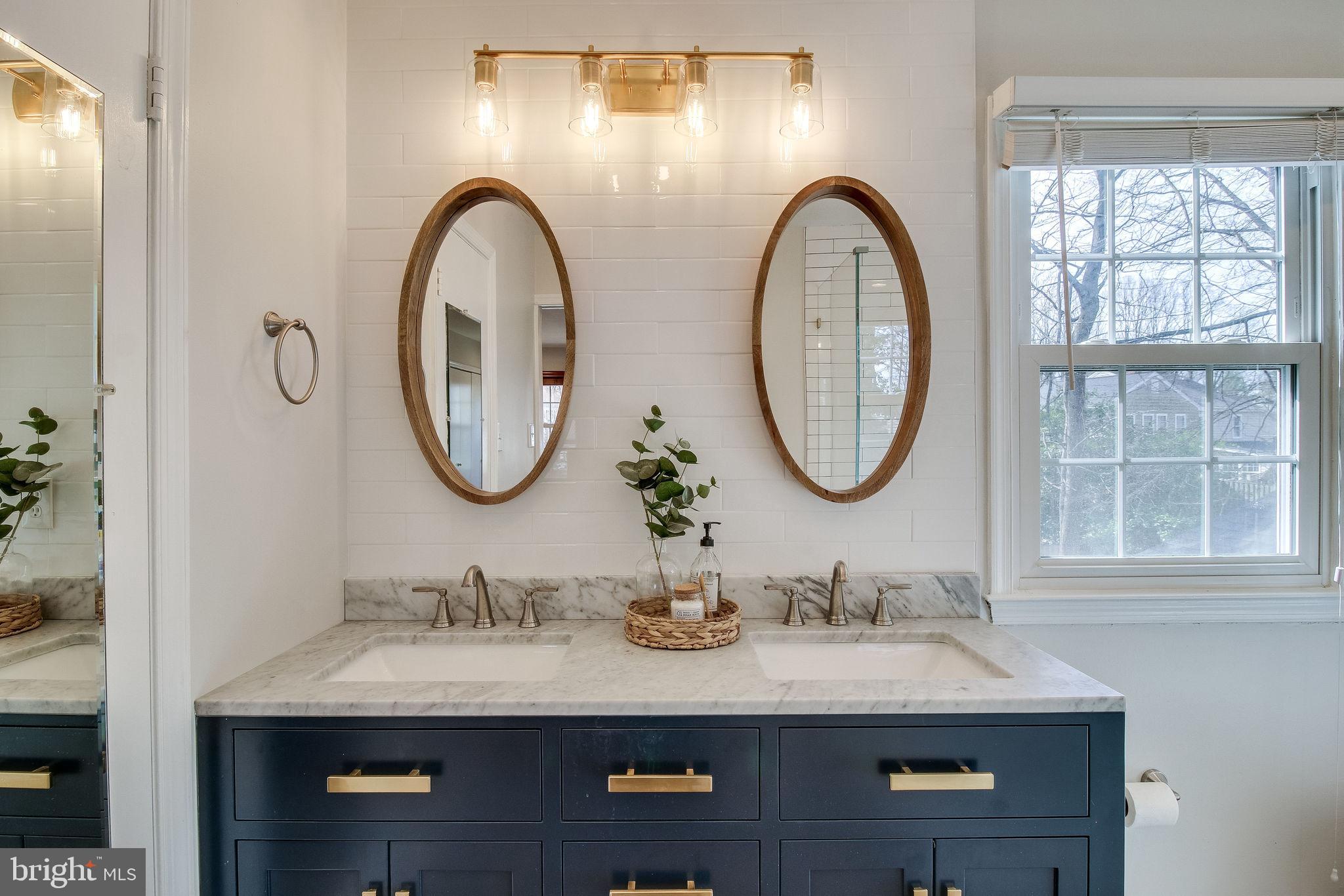 9303 Winbourne Road Burke, VA 22015 - Photo 37 of 80 Master bath with dual sinks and walk-in closet