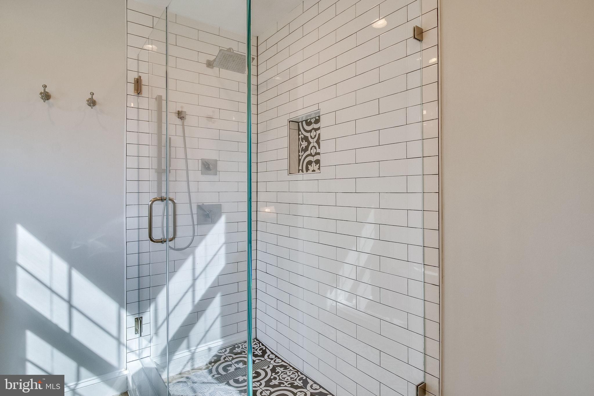 9303 Winbourne Road Burke, VA 22015 - Photo 39 of 80 Stunning shower with subway and moroccan tiles