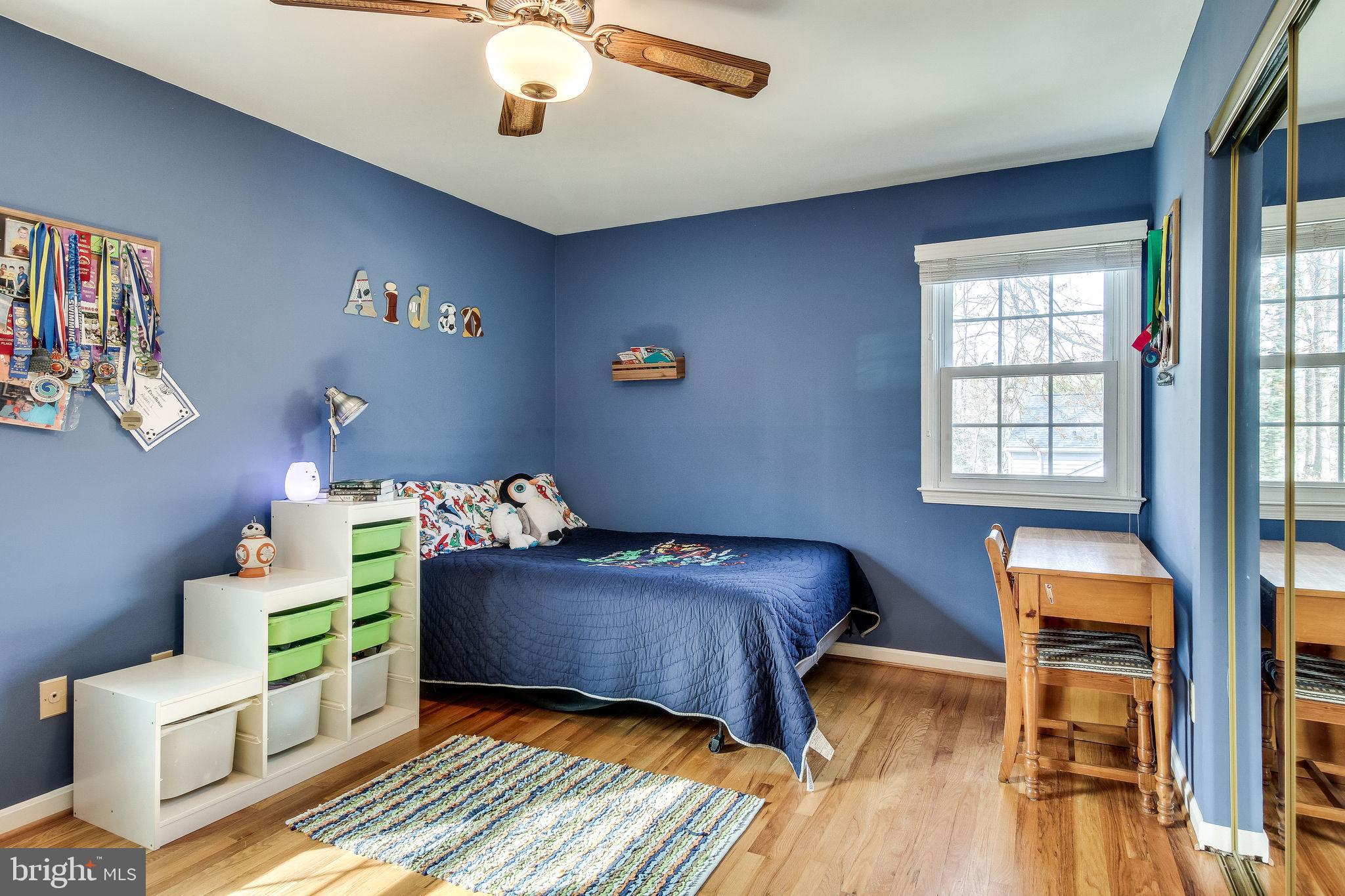 9303 Winbourne Road Burke, VA 22015 - Photo 41 of 80 Large bedroom with hardwood floors