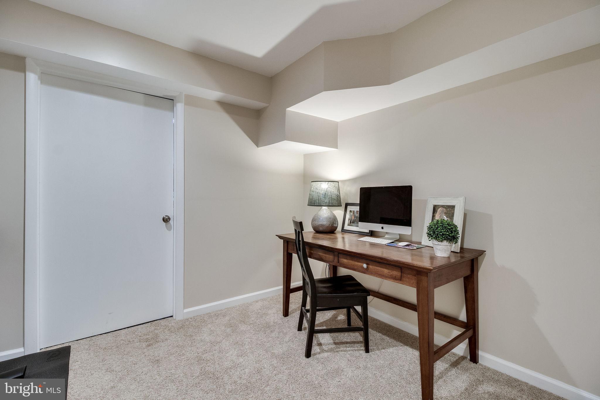 9303 Winbourne Road Burke, VA 22015 - Photo 59 of 80 Basement bonus room. Door to laundry and storage
