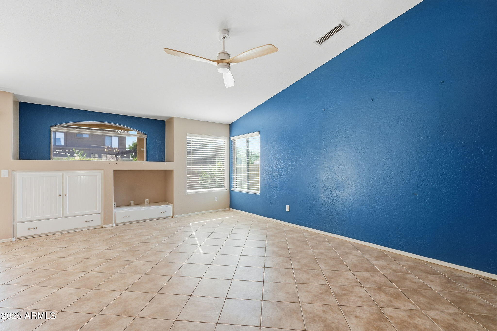 17509 West Rock Ledge Road Goodyear, AZ 85338 - Photo 12 of 55 a view of an empty room with a window