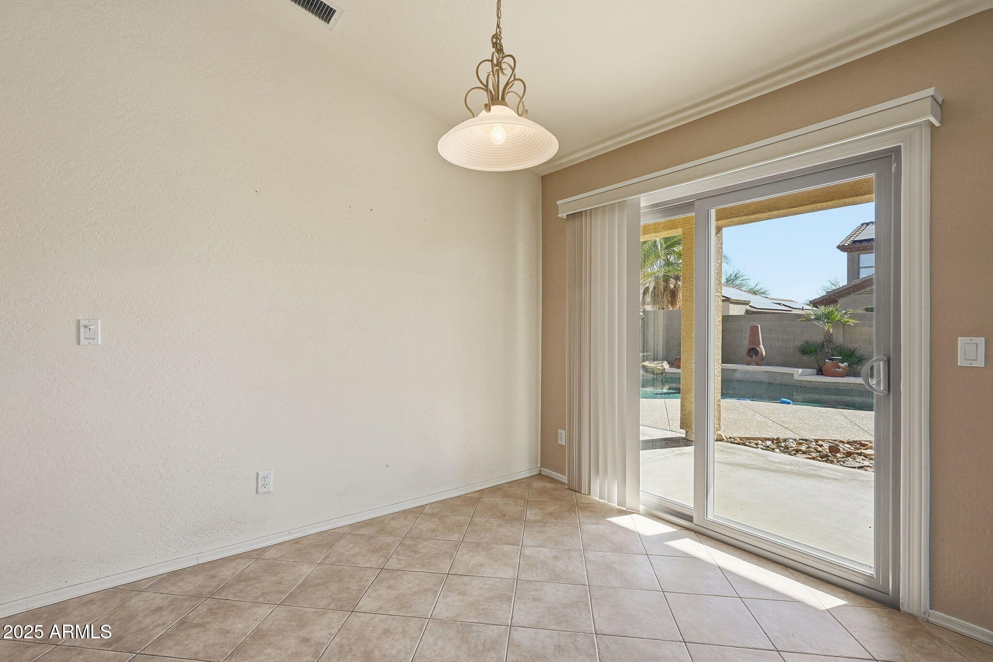 17509 West Rock Ledge Road Goodyear, AZ 85338 - Photo 20 of 55 a view of an empty room and window