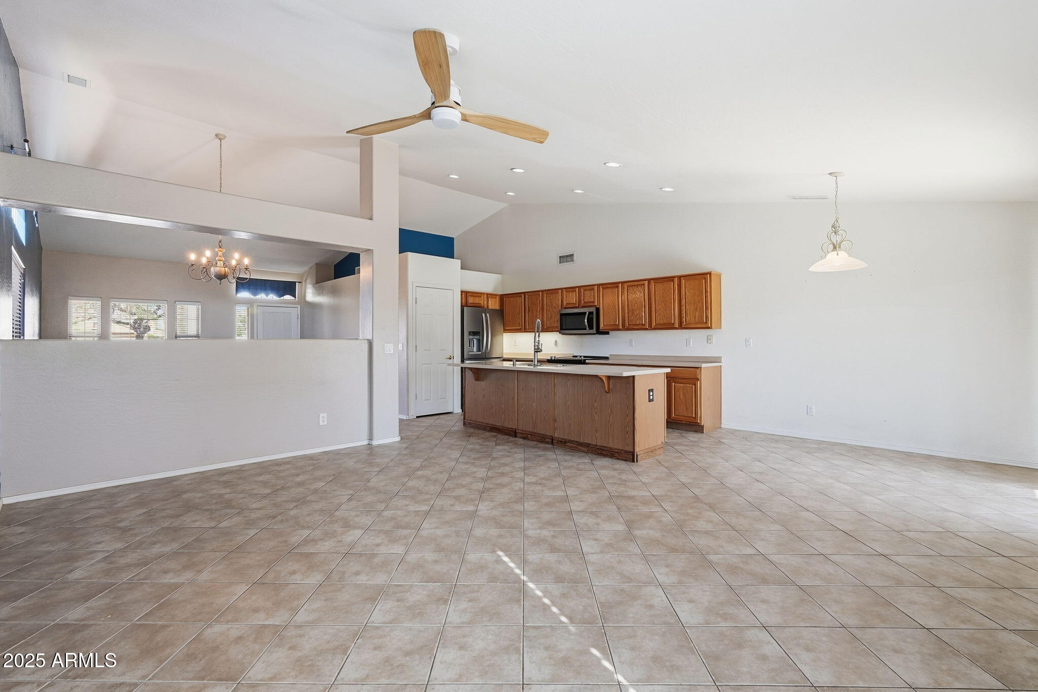 17509 West Rock Ledge Road Goodyear, AZ 85338 - Photo 21 of 55 a view of a kitchen with a sink