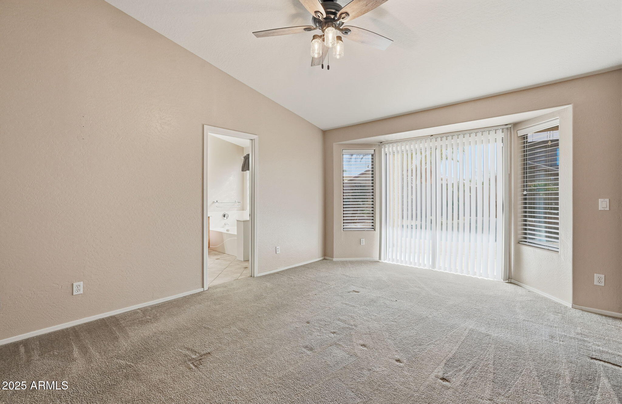 17509 West Rock Ledge Road Goodyear, AZ 85338 - Photo 24 of 55 a view of an empty room with a window