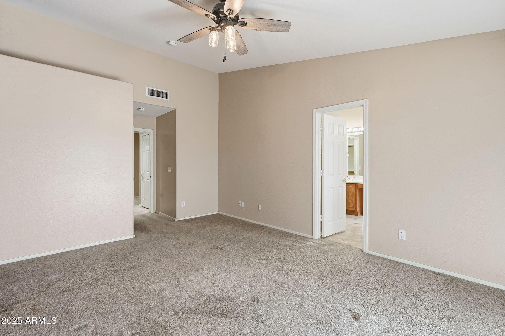 17509 West Rock Ledge Road Goodyear, AZ 85338 - Photo 25 of 55 wooden floor in an empty room