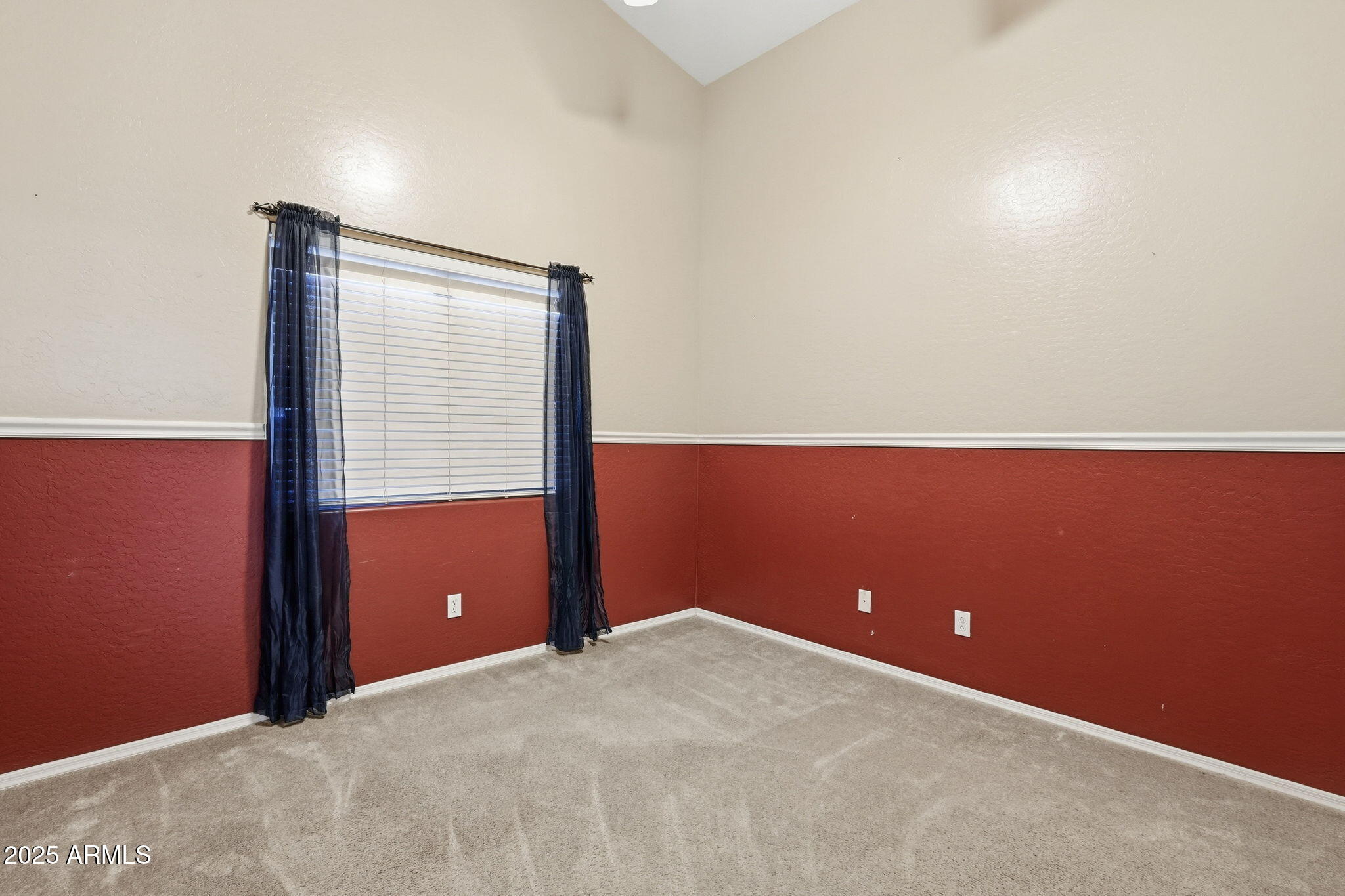 17509 West Rock Ledge Road Goodyear, AZ 85338 - Photo 28 of 55 a view of an empty room with a window