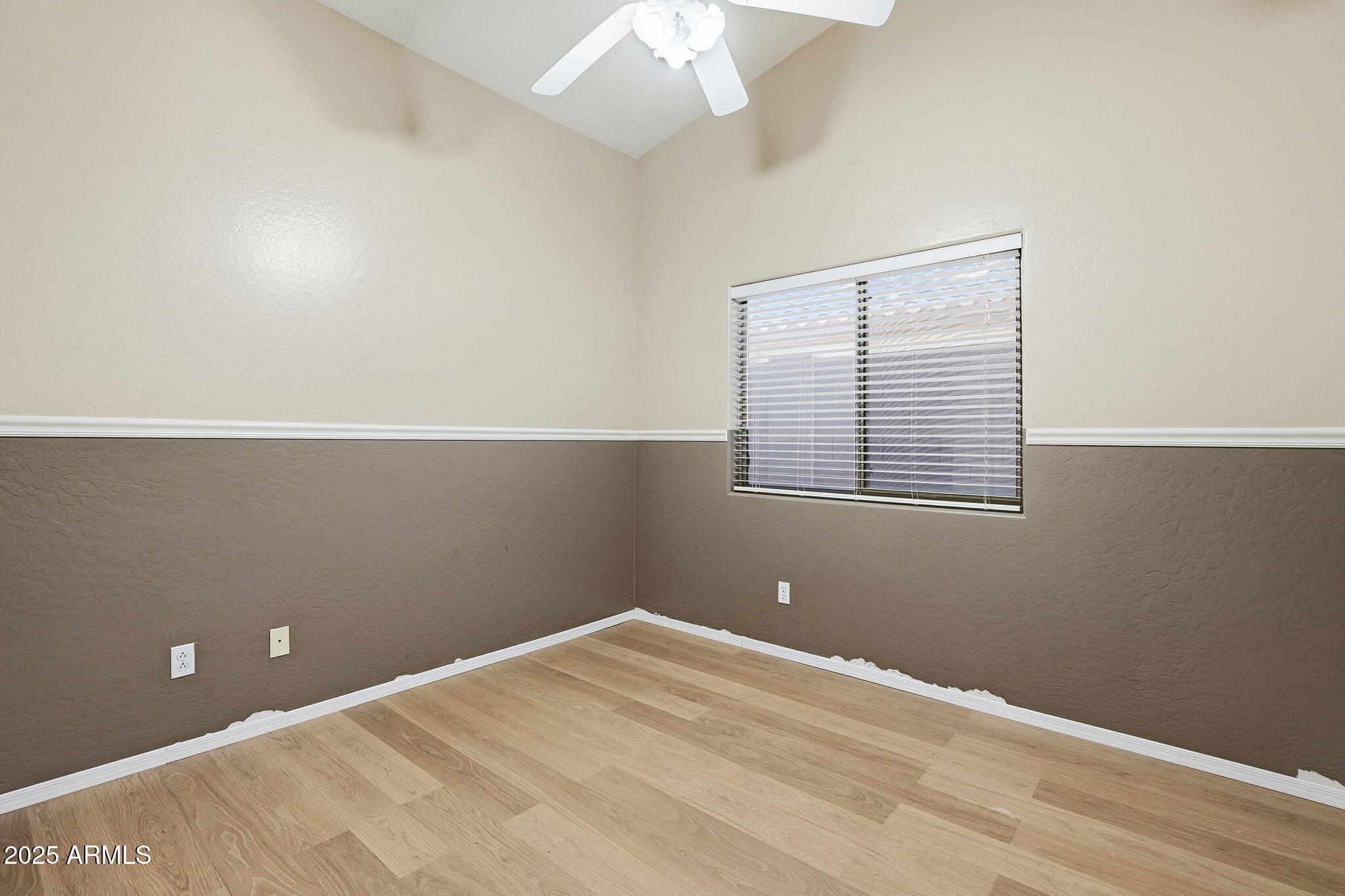 17509 West Rock Ledge Road Goodyear, AZ 85338 - Photo 30 of 55 an empty room with a window