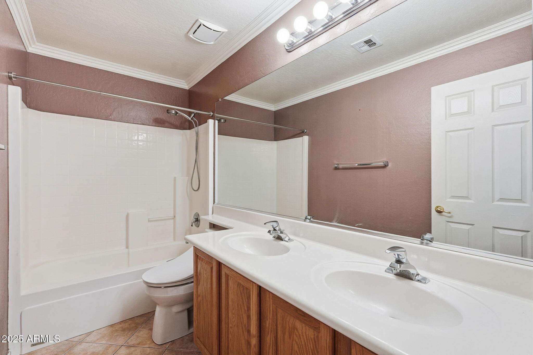 17509 West Rock Ledge Road Goodyear, AZ 85338 - Photo 33 of 55 a bathroom with a sink toilet and shower